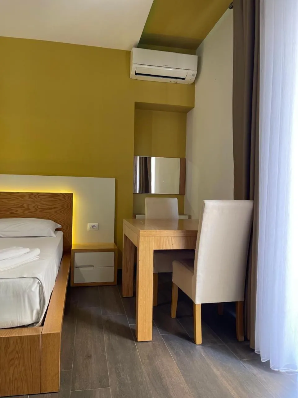 Bed in Sunrise Luxury Apartments