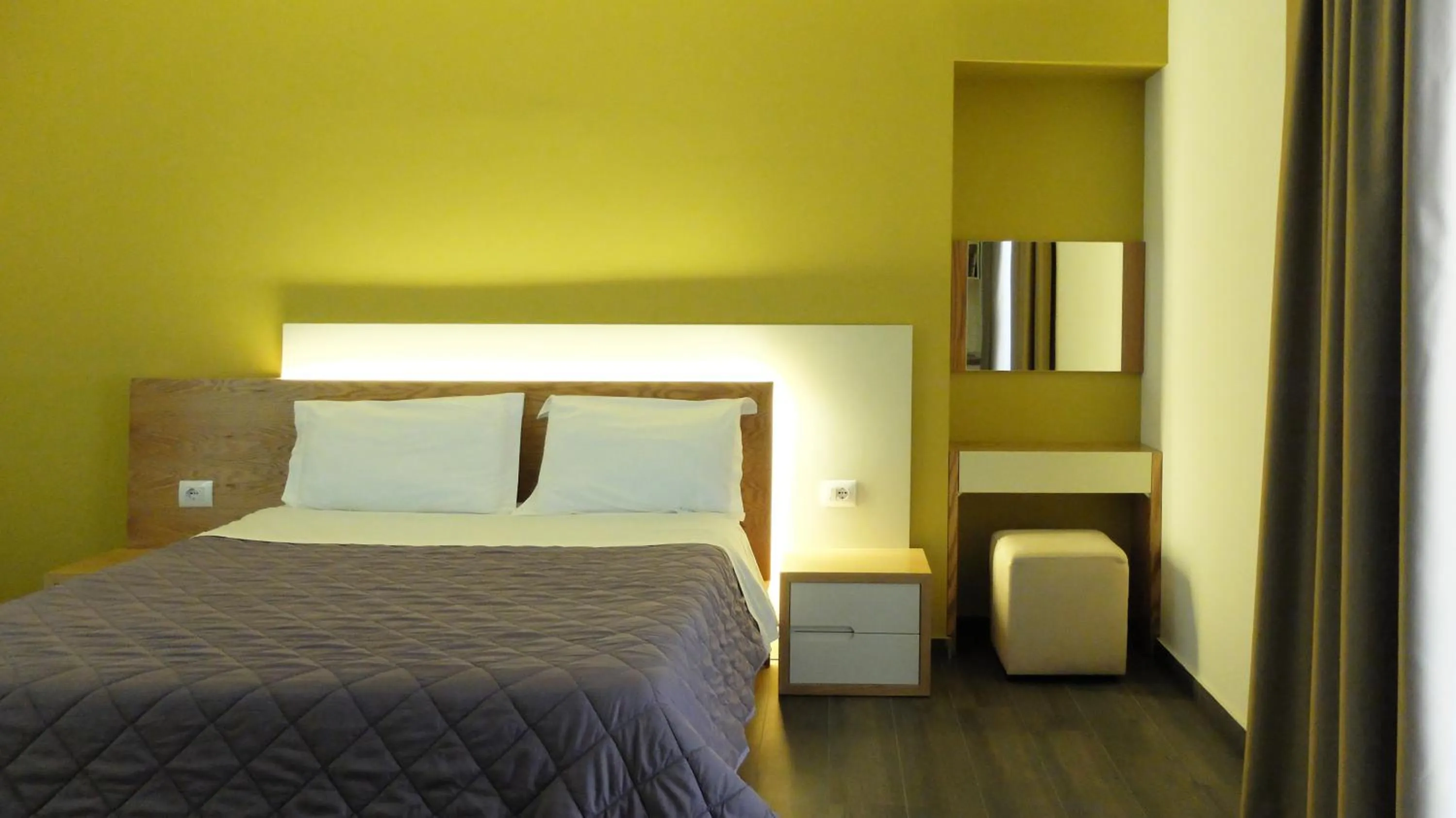 Bed in Sunrise Luxury Apartments