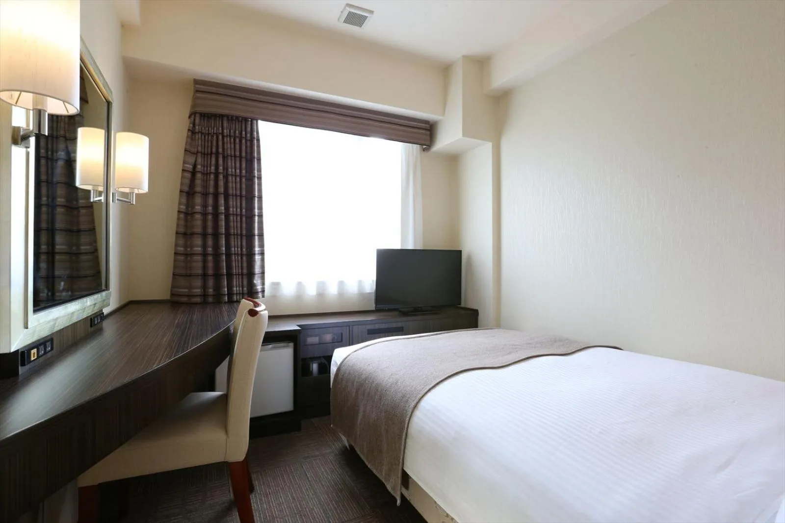 Bed in Hotel Hokke Club Niigata Nagaoka