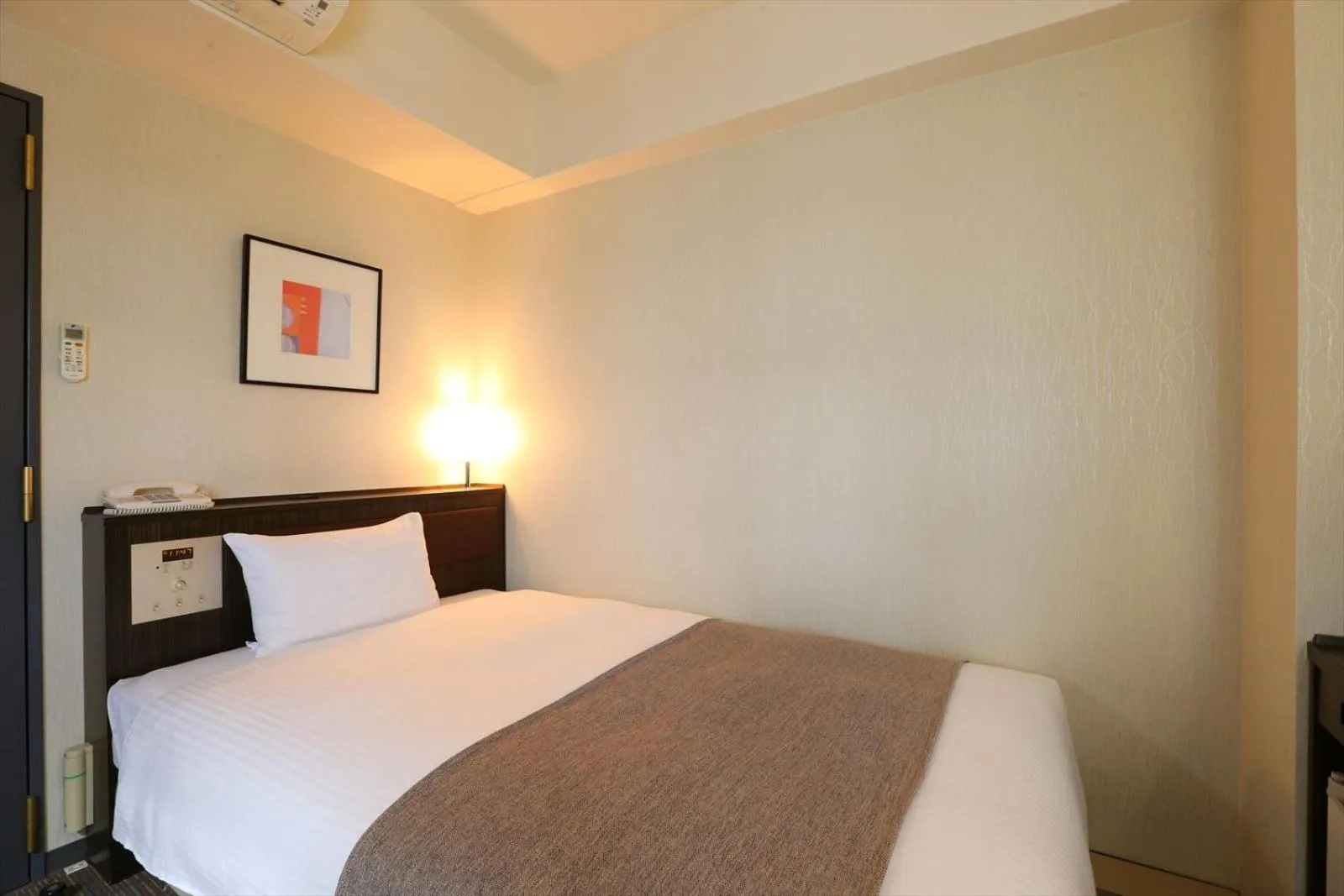 Bed in Hotel Hokke Club Niigata Nagaoka