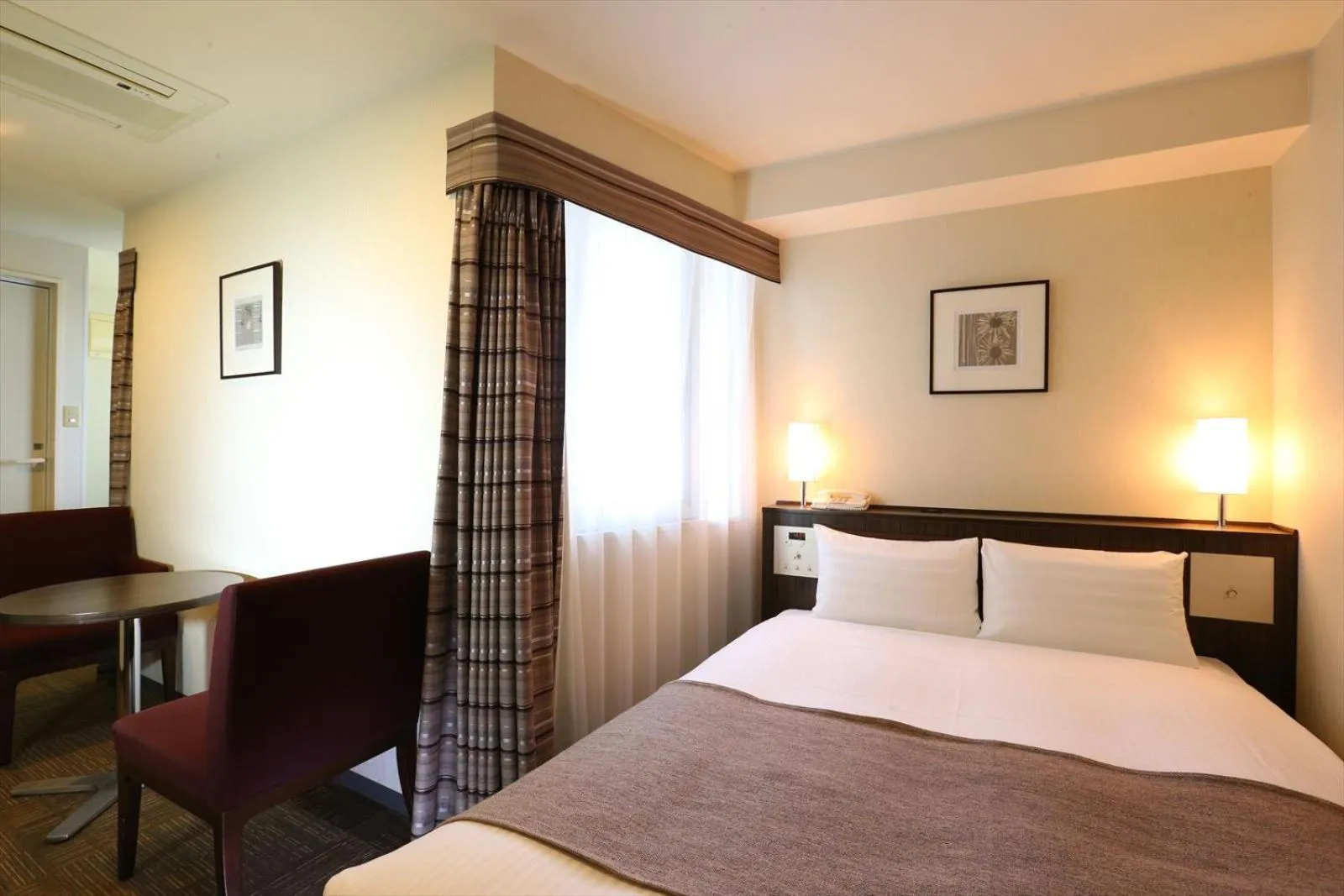 Bed in Hotel Hokke Club Niigata Nagaoka