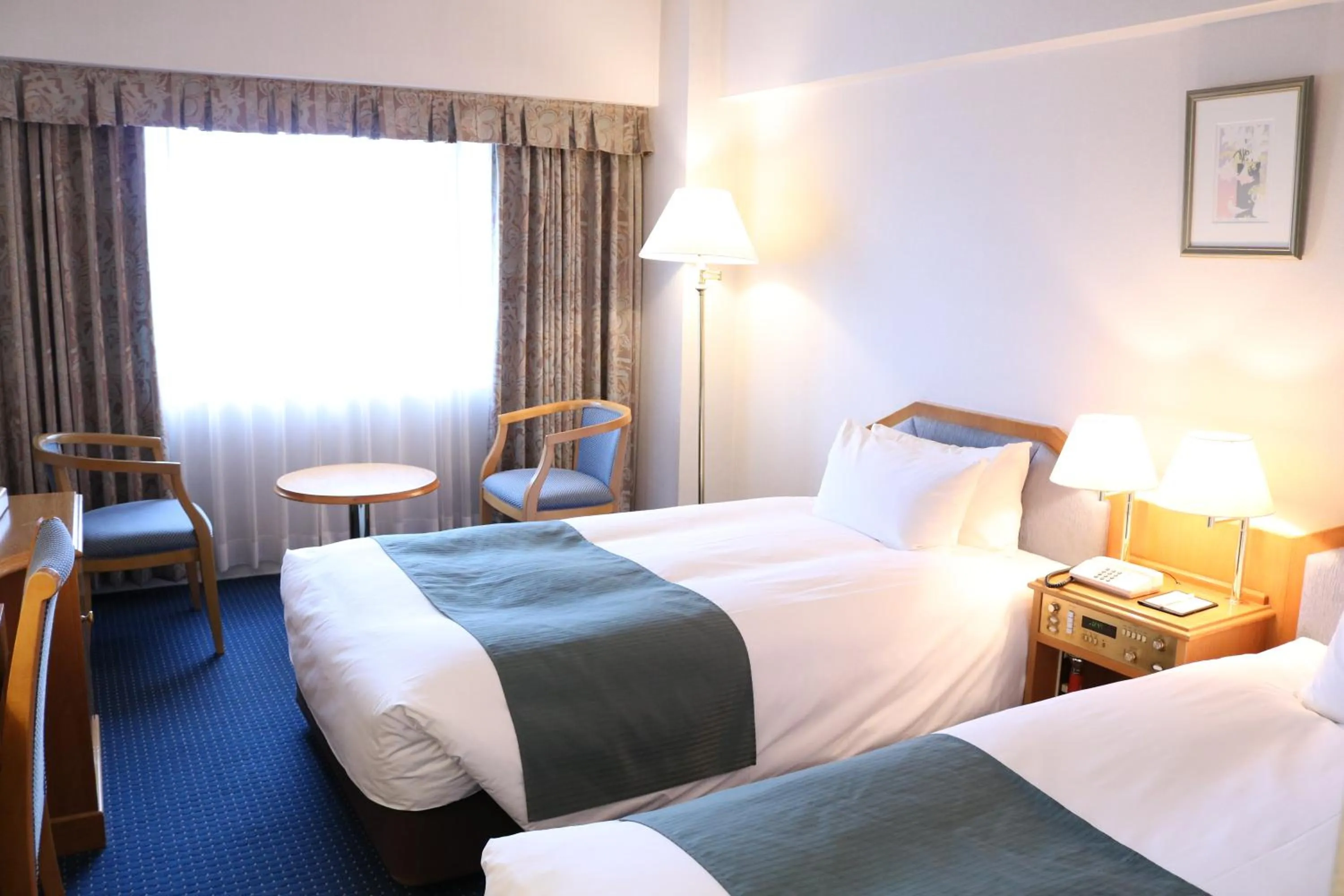 Photo of the whole room, Bed in Hotel New Otani Tottori