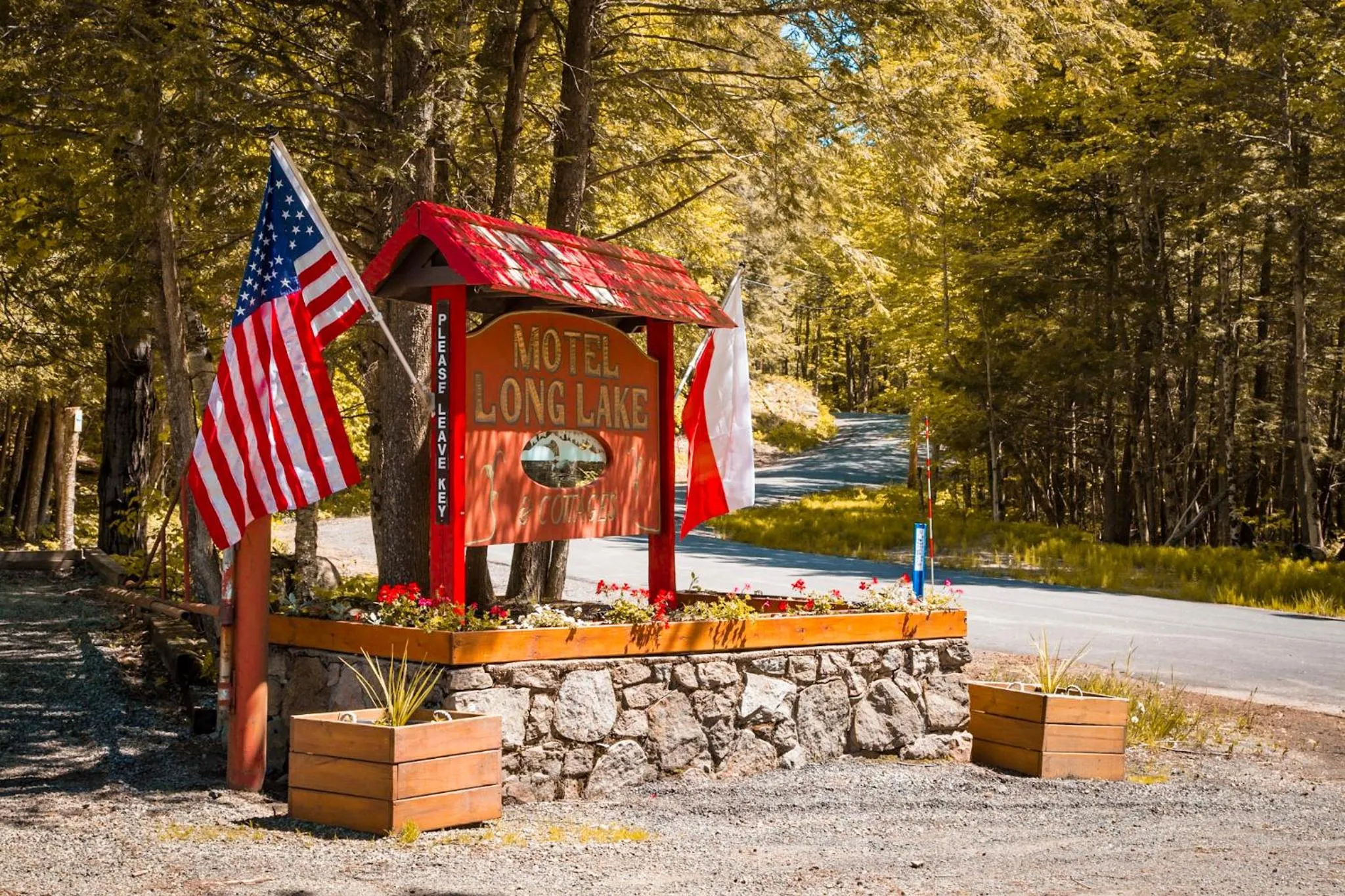 Property logo or sign in Motel Long Lake and Cottages