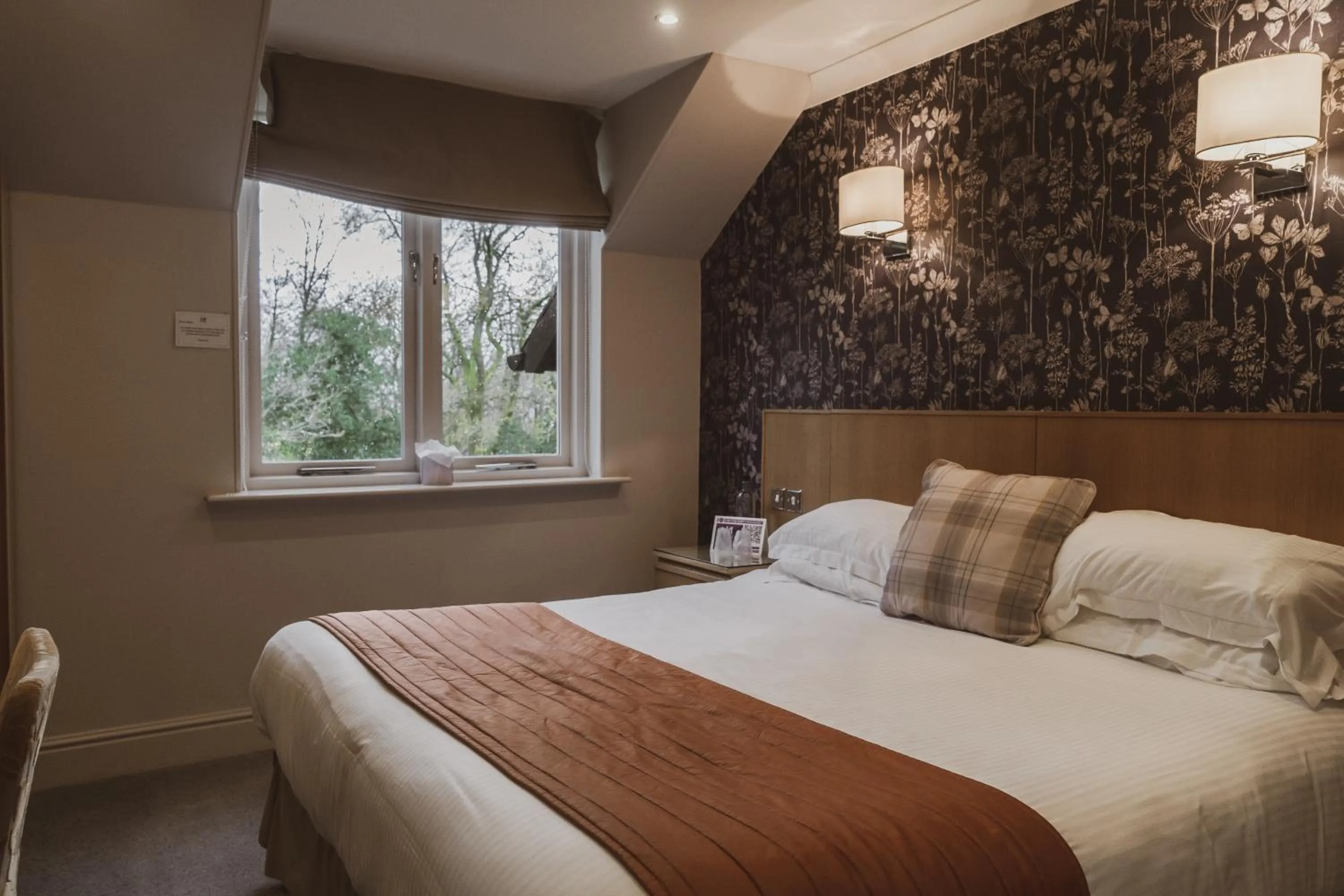 Bed in Merewood Country House Hotel