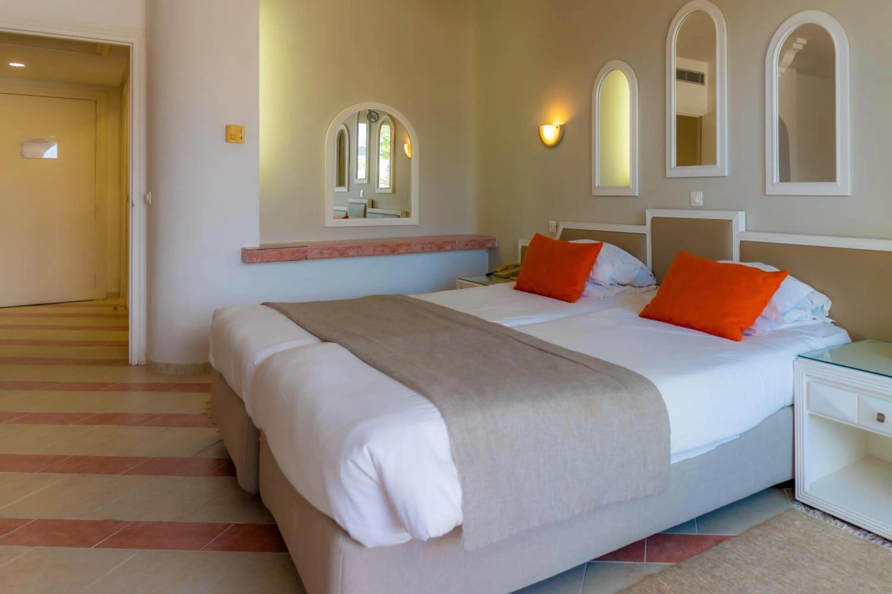 Bed in Royal Tulip Taj Sultan