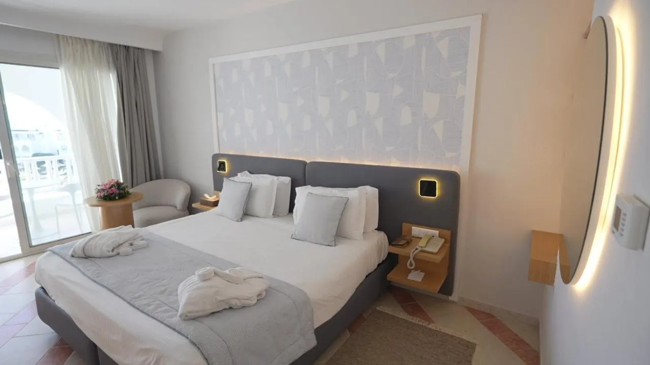 Bed in Royal Tulip Taj Sultan