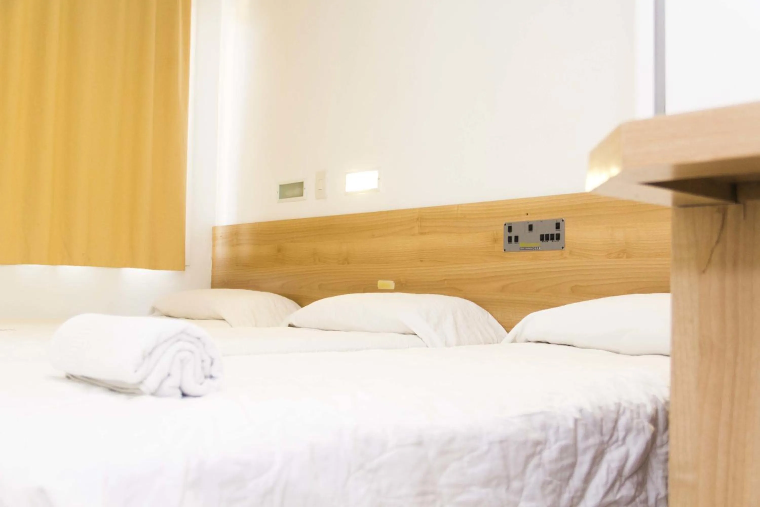 Bed in Minuano Hotel Home próximo ao aeroporto