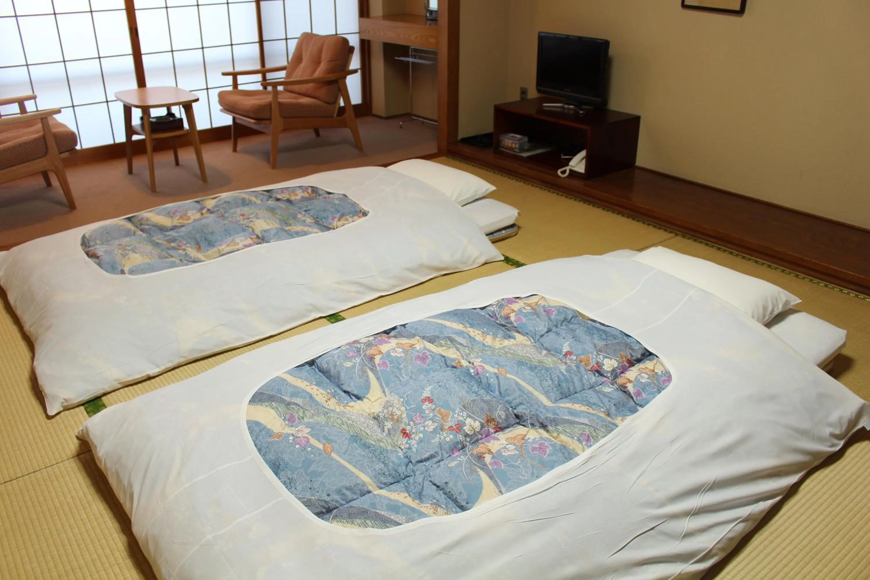 Bed in Miyajima Seaside Hotel