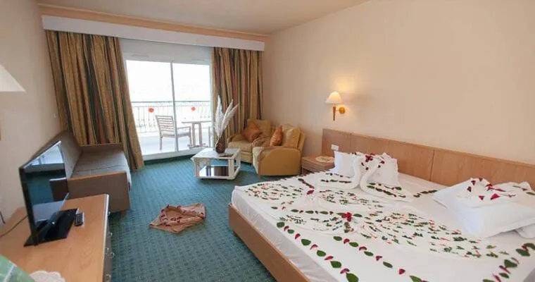 Seating area, Bed in El Mouradi Hammam Bourguiba