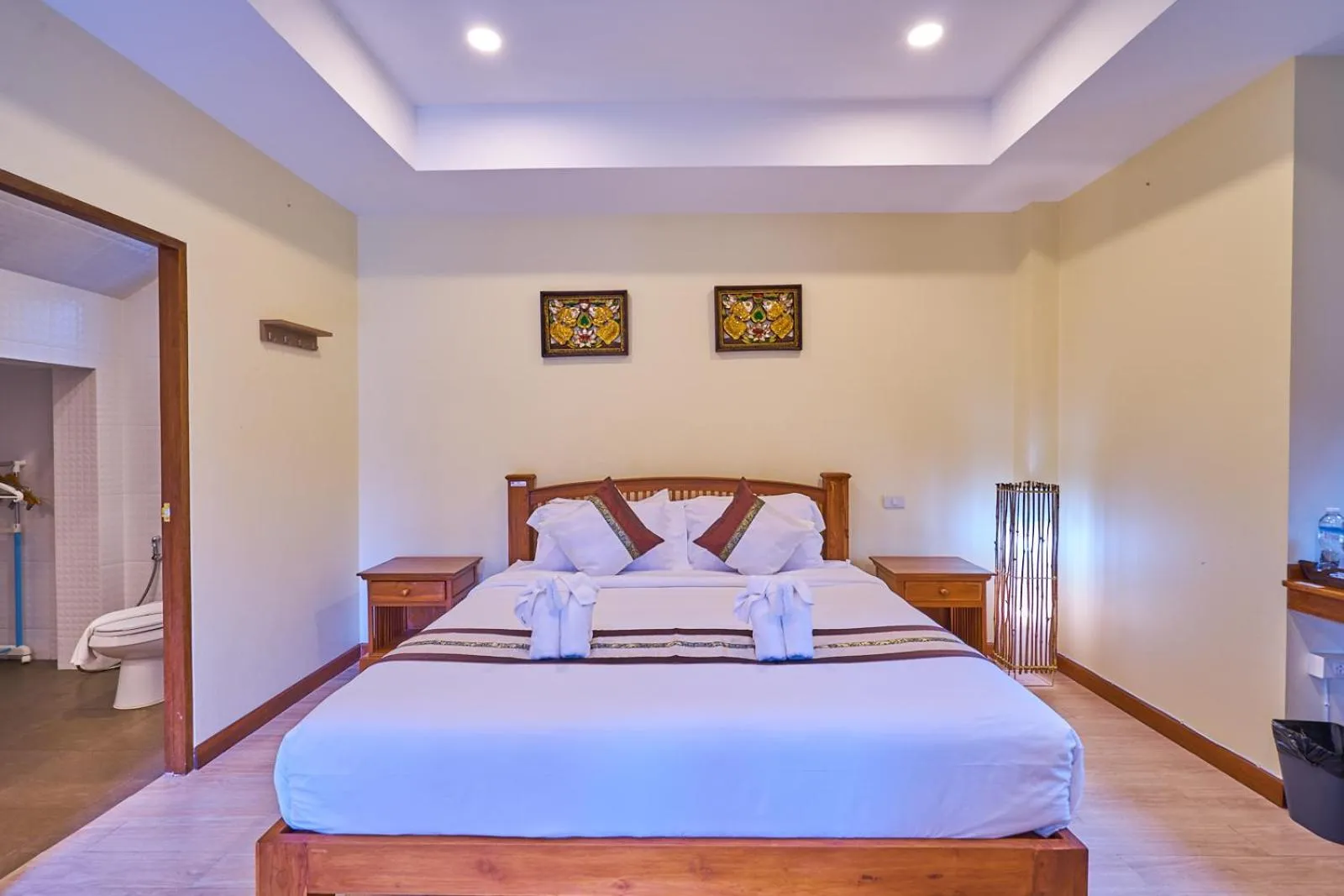 Bed in Mina Garden Villa Resort