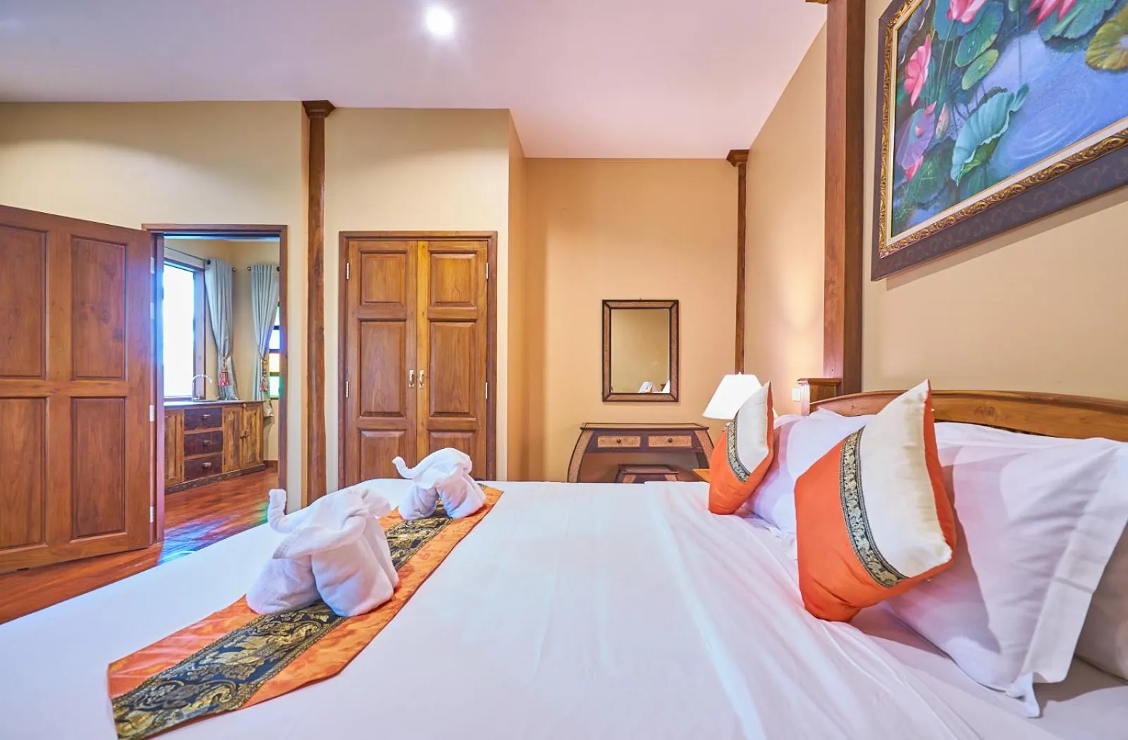 Bed in Mina Garden Villa Resort