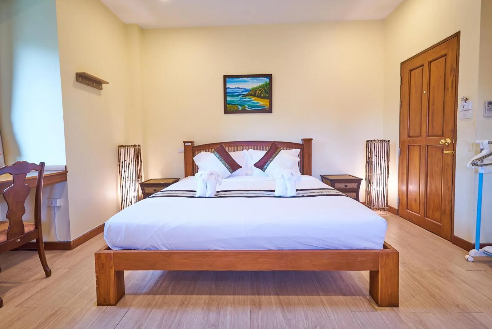 Bed in Mina Garden Villa Resort