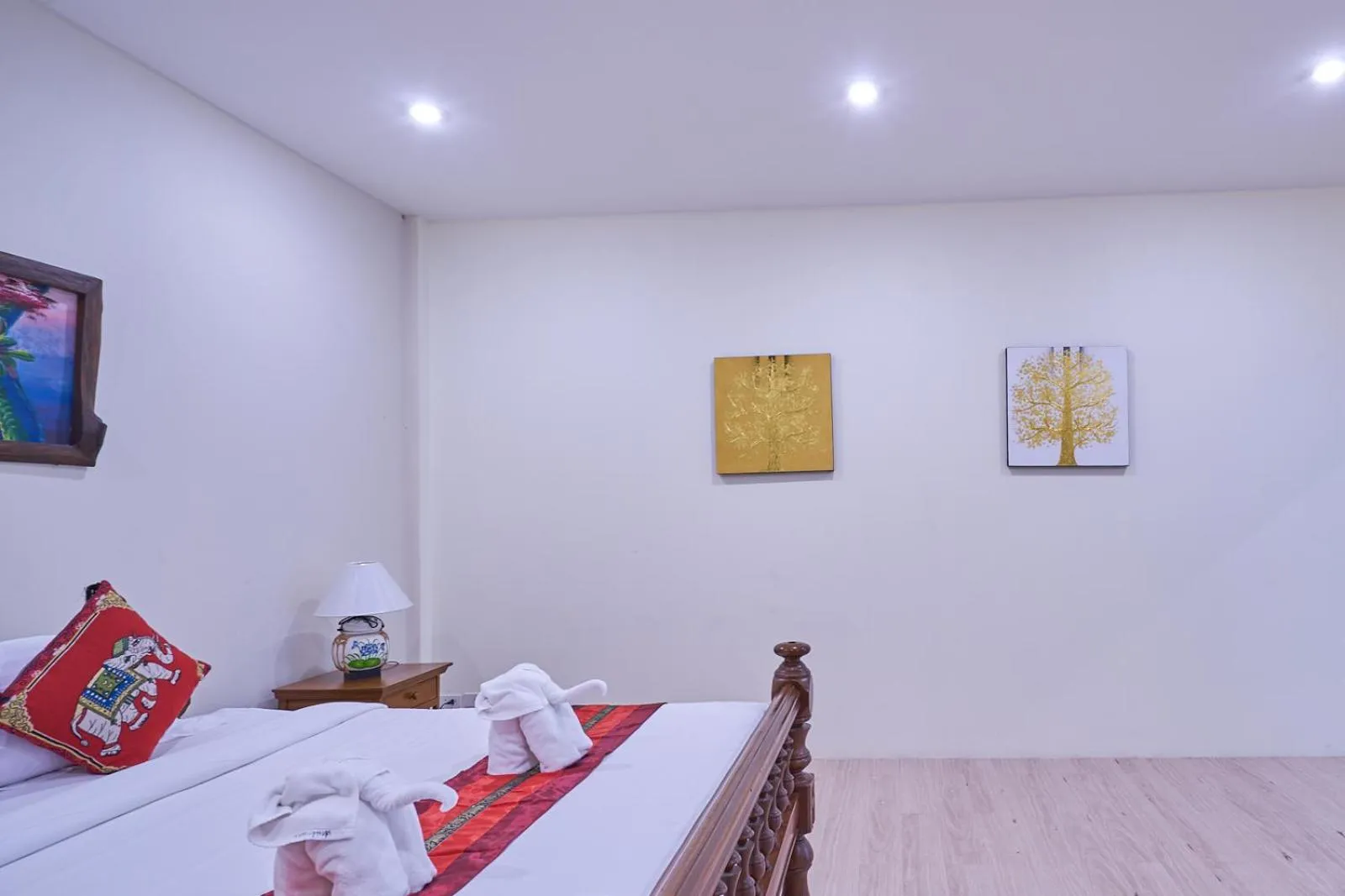 Bed in Mina Garden Villa Resort