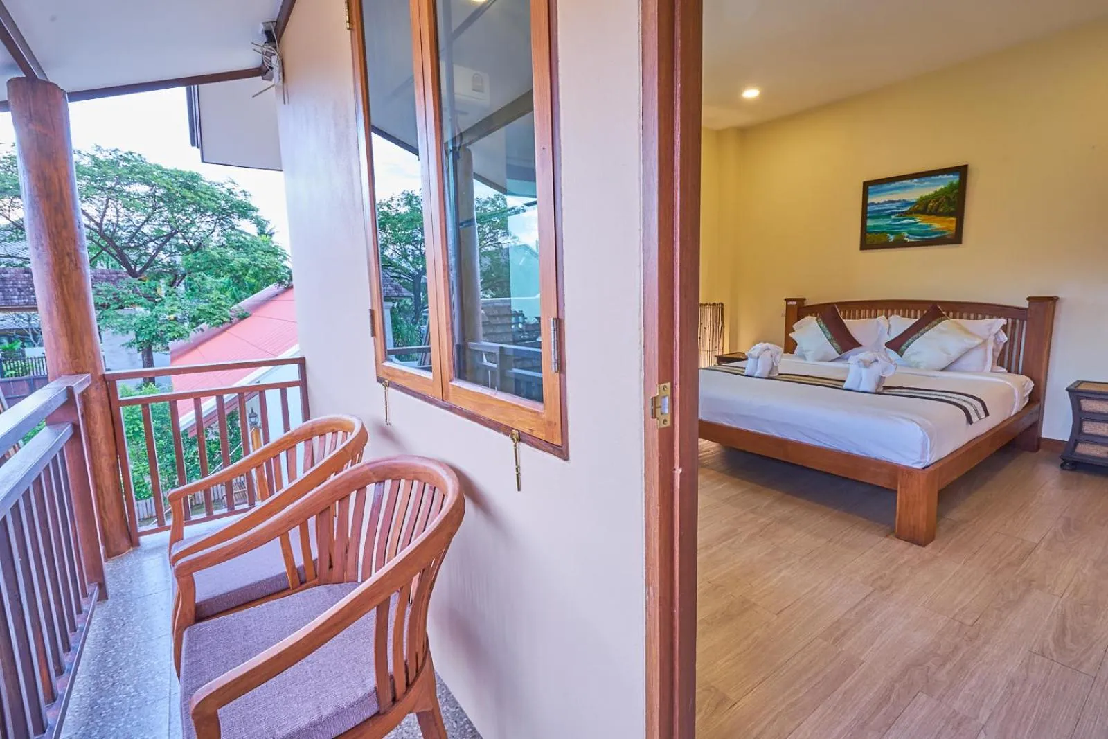 Bed in Mina Garden Villa Resort