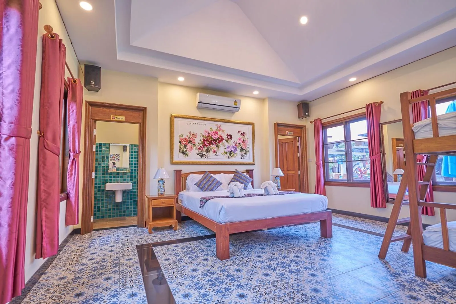 Bed in Mina Garden Villa Resort