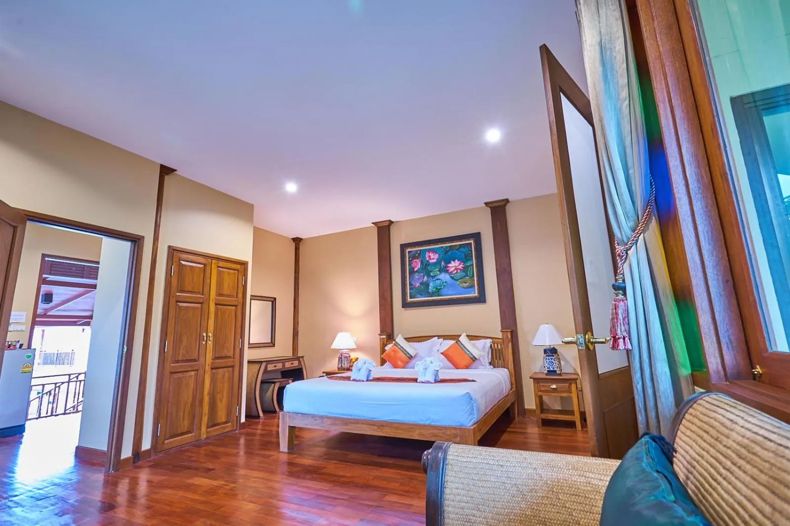 Bed in Mina Garden Villa Resort