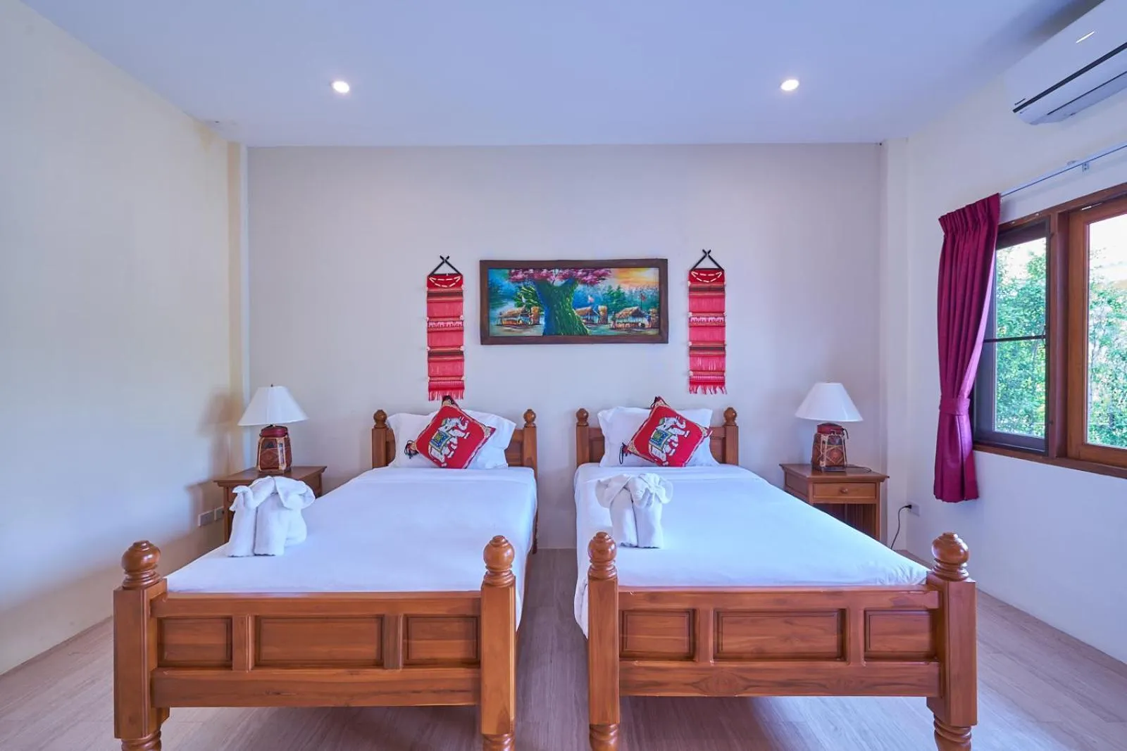 Bed in Mina Garden Villa Resort