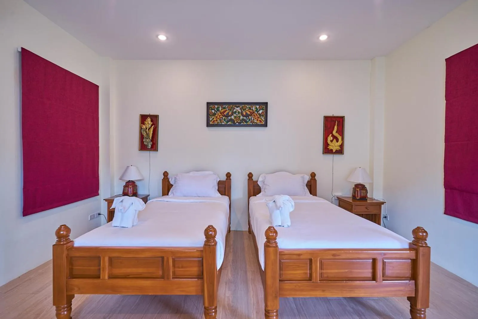 Bed in Mina Garden Villa Resort