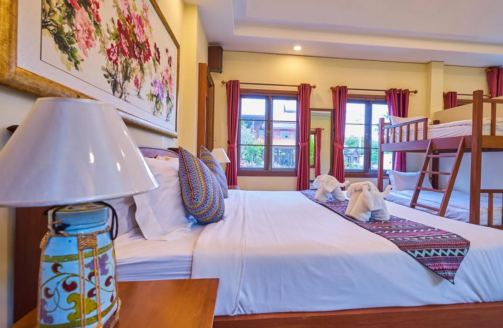 Bed in Mina Garden Villa Resort