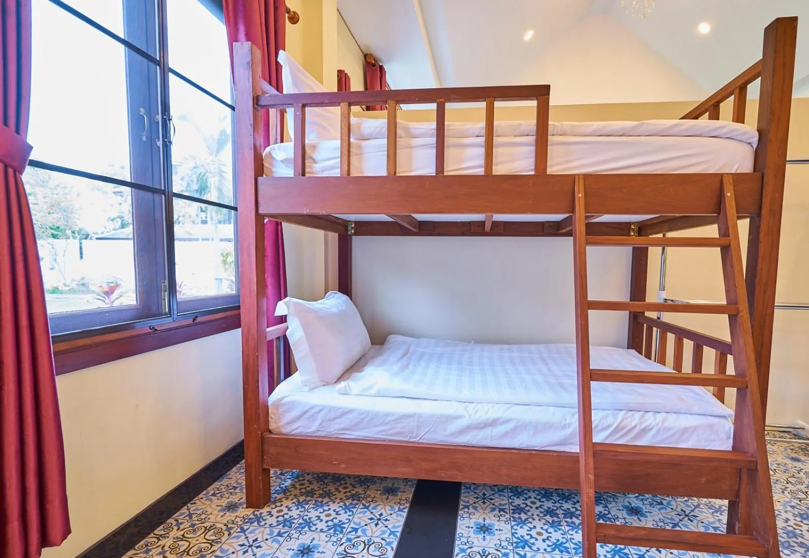 Bed in Mina Garden Villa Resort