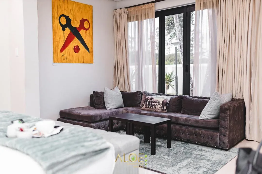 Bed in Aloe Lifestyle Hotel