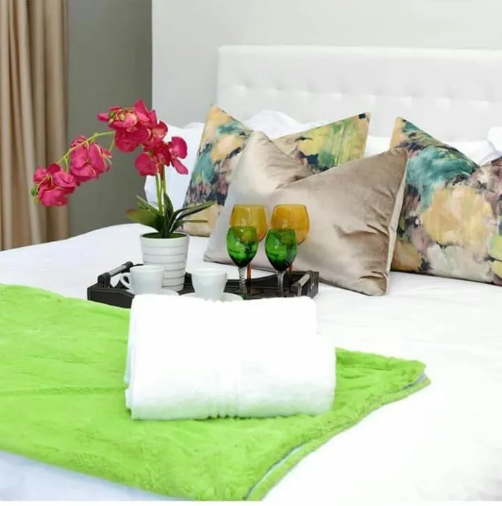 Bed in Aloe Lifestyle Hotel