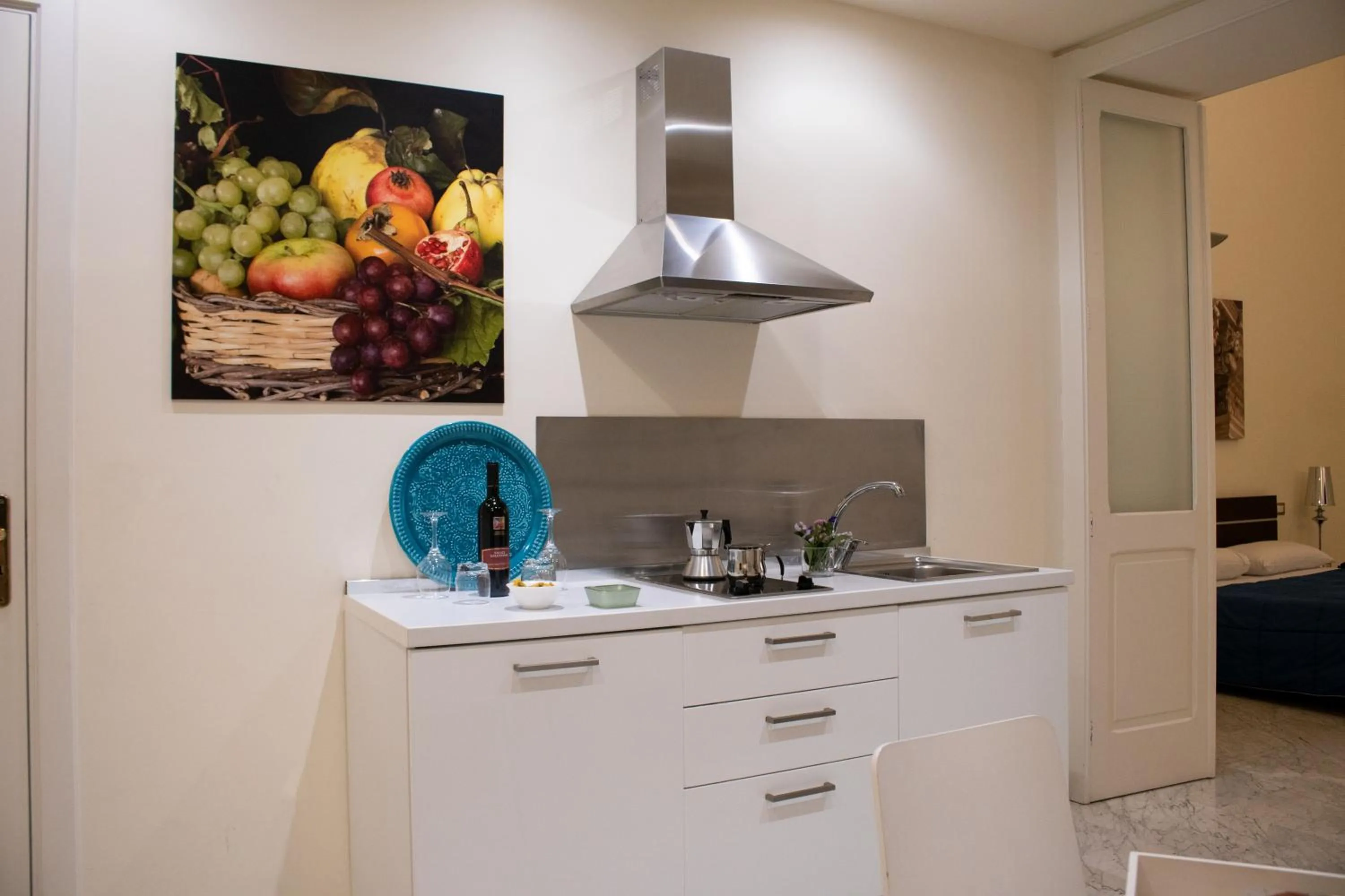 Kitchen or kitchenette in Apollo Suites