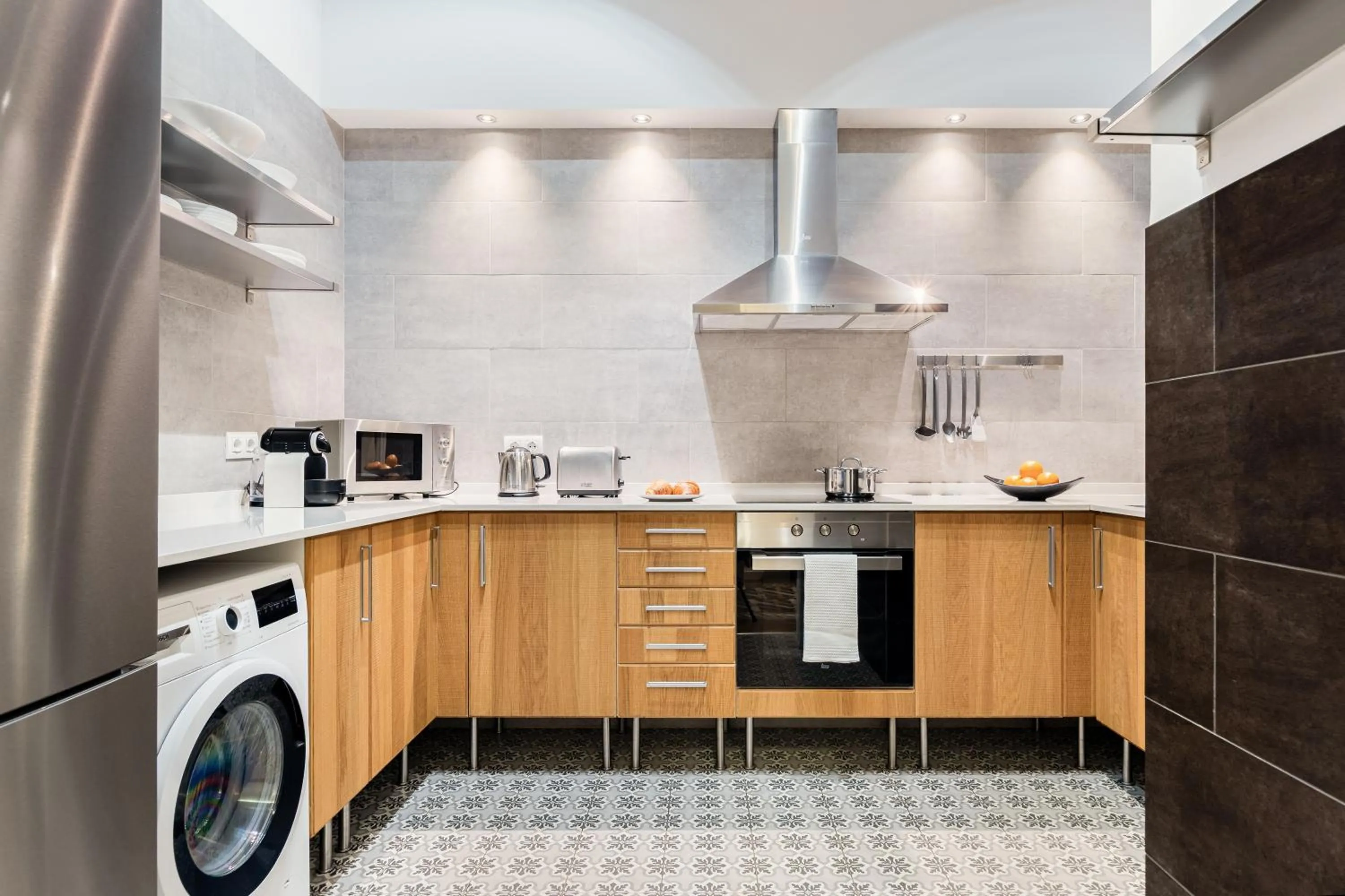 dishwasher in Fuster Apartments by Aspasios