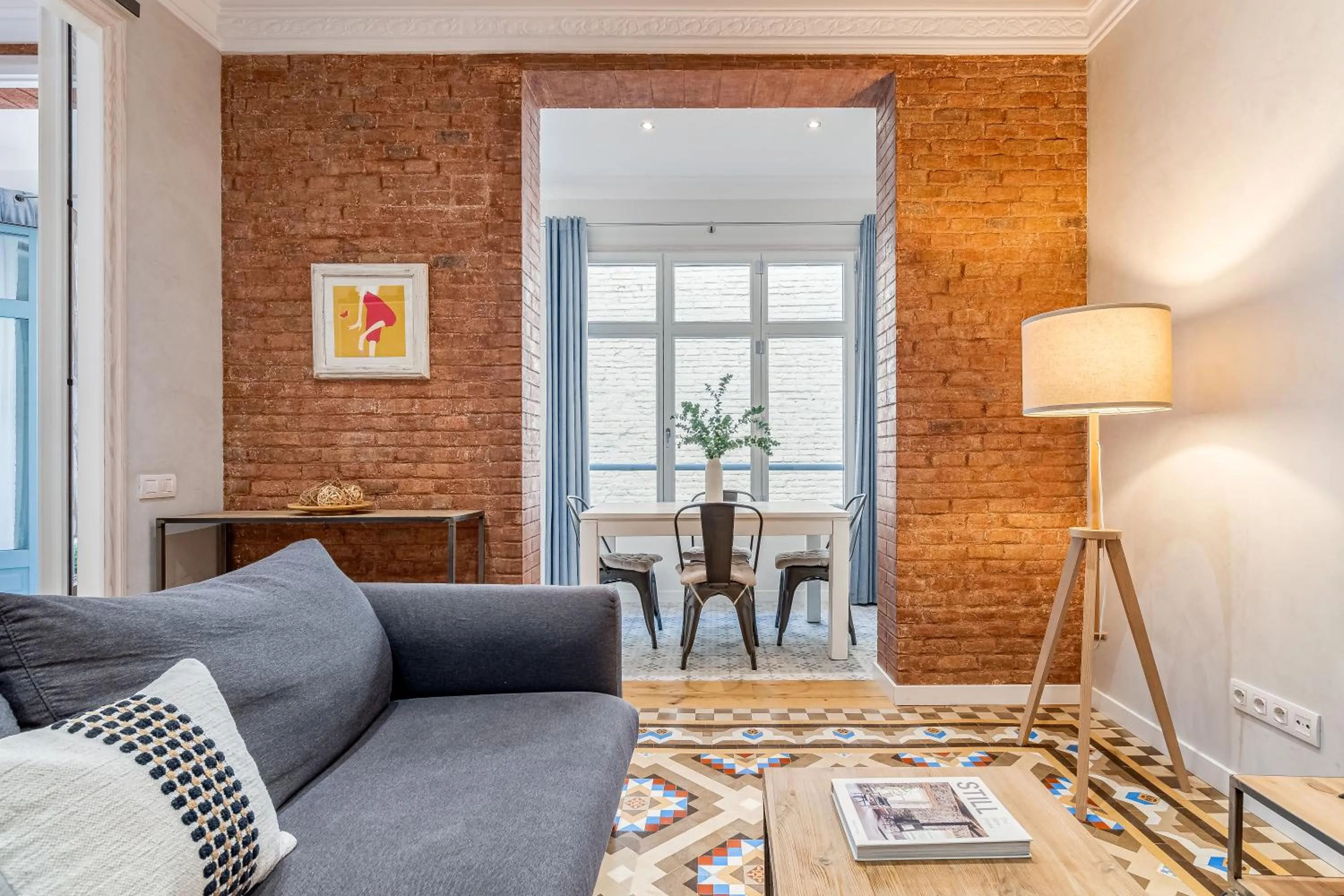 Living room in Fuster Apartments by Aspasios