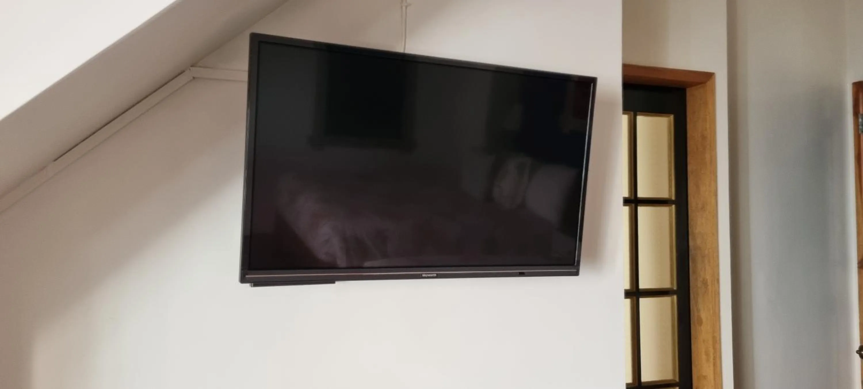 TV and multimedia in Guest Haven Chalet Baguio Bed and Breakfast