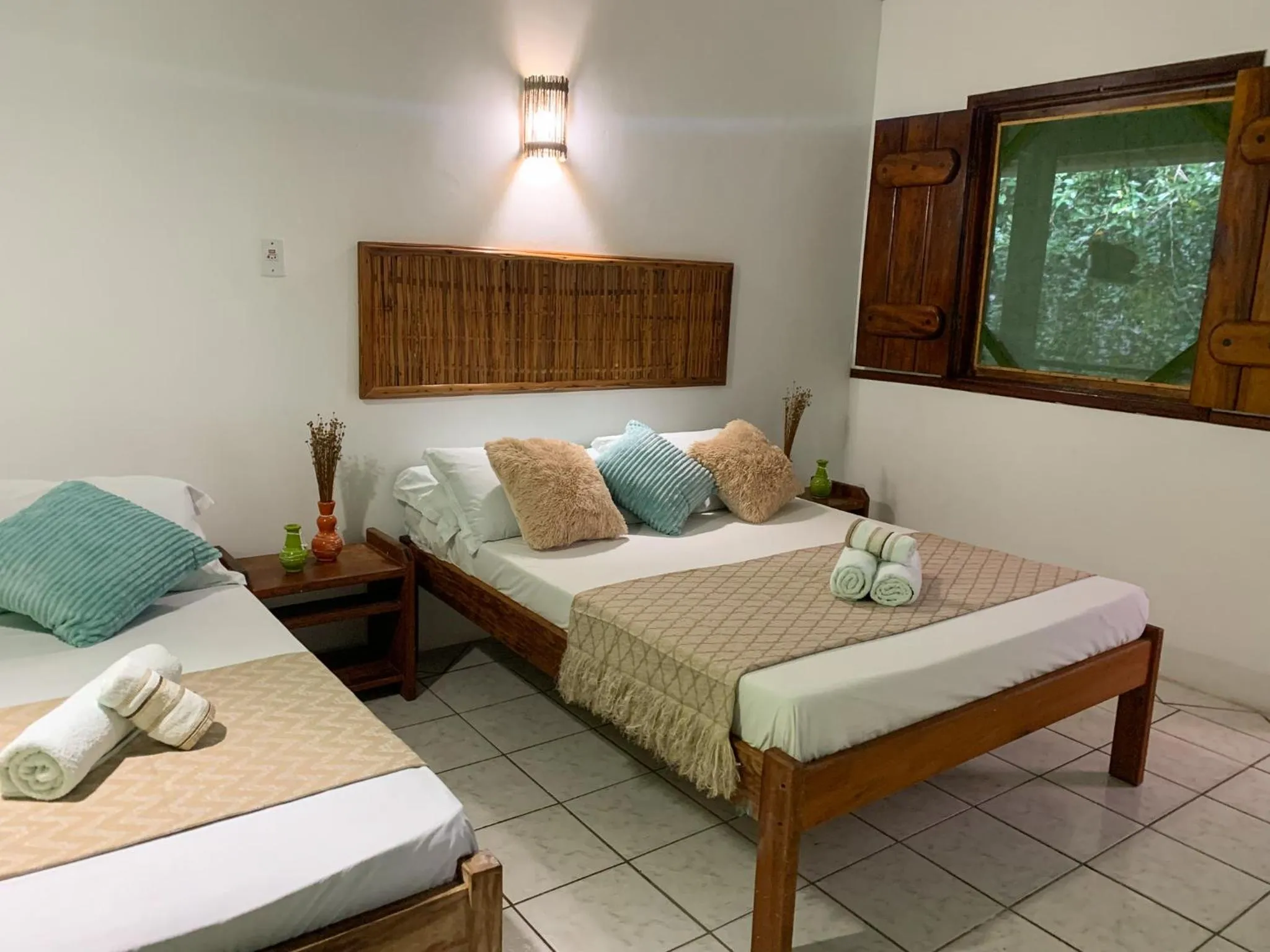 Bed in Pousada Lanai