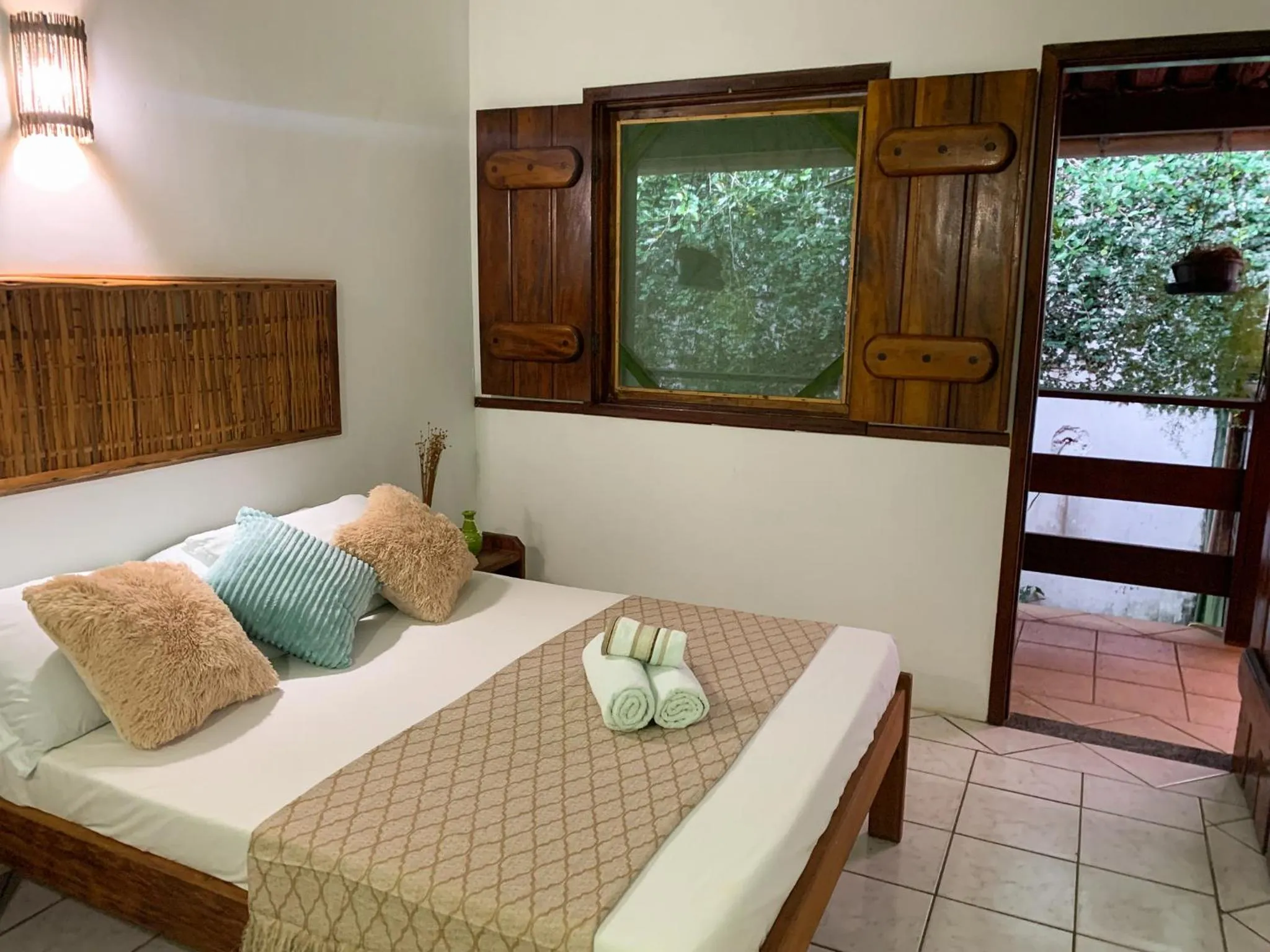 Bed in Pousada Lanai