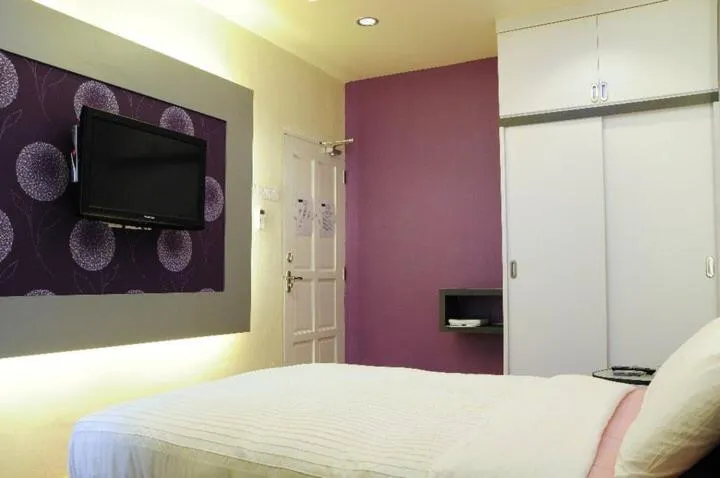 Bed in The One Vacation Home