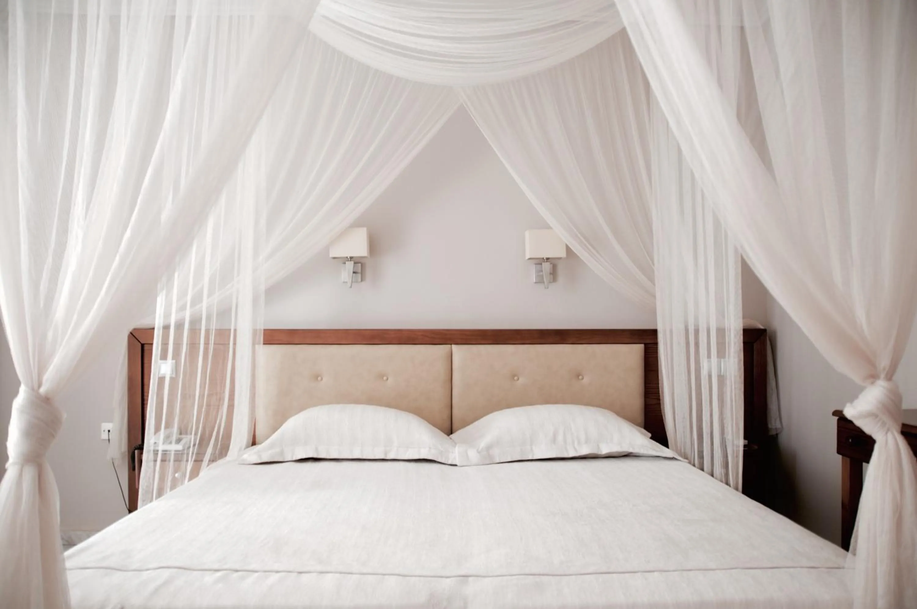 Bed in Calypso Beach Hotel