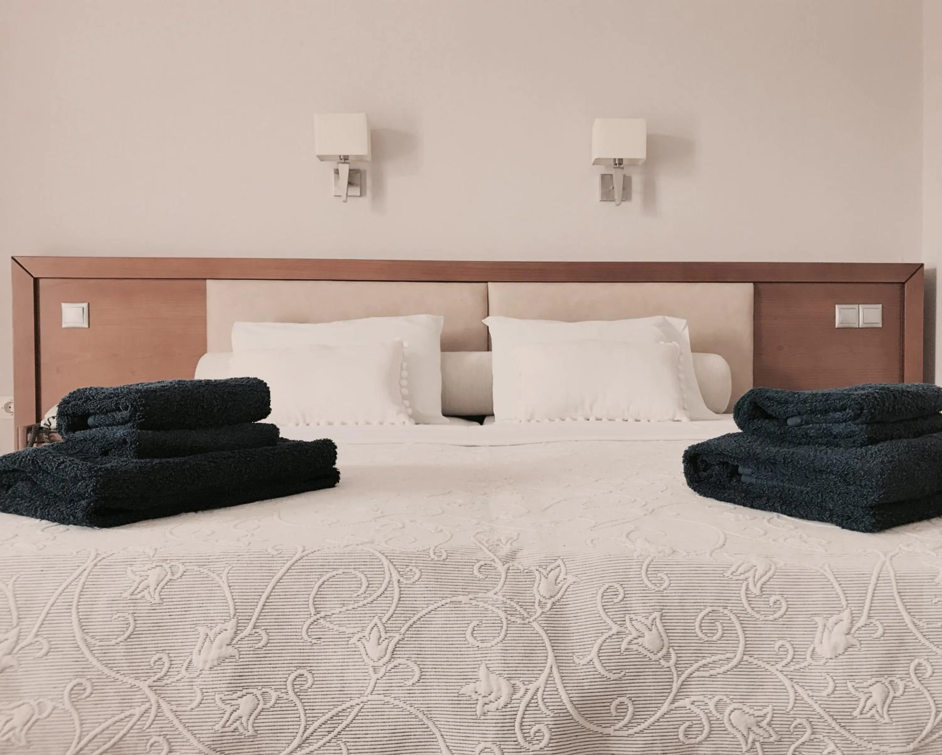 Bed in Calypso Beach Hotel