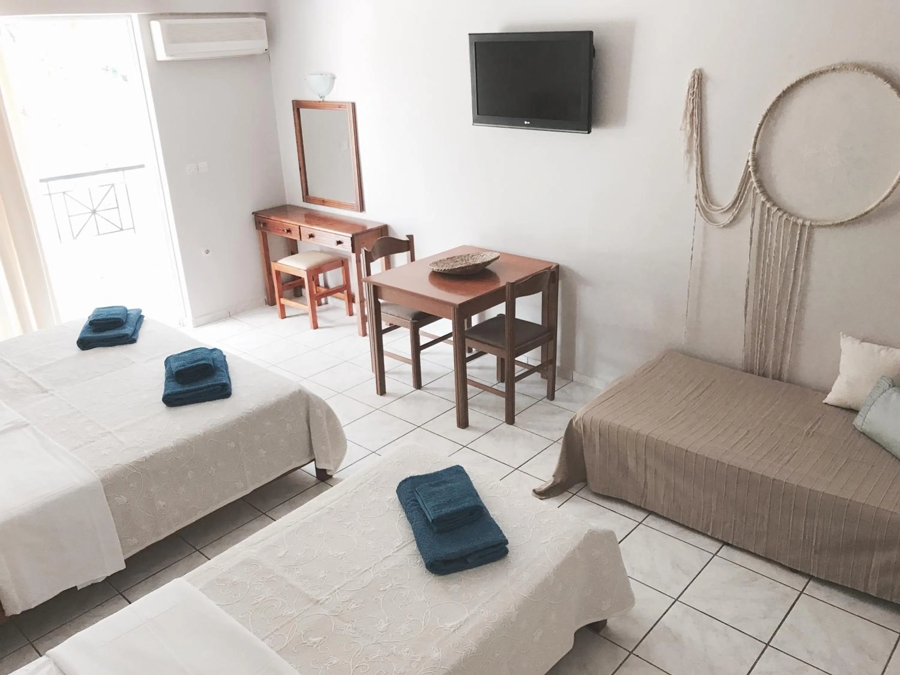 Bed in Calypso Beach Hotel