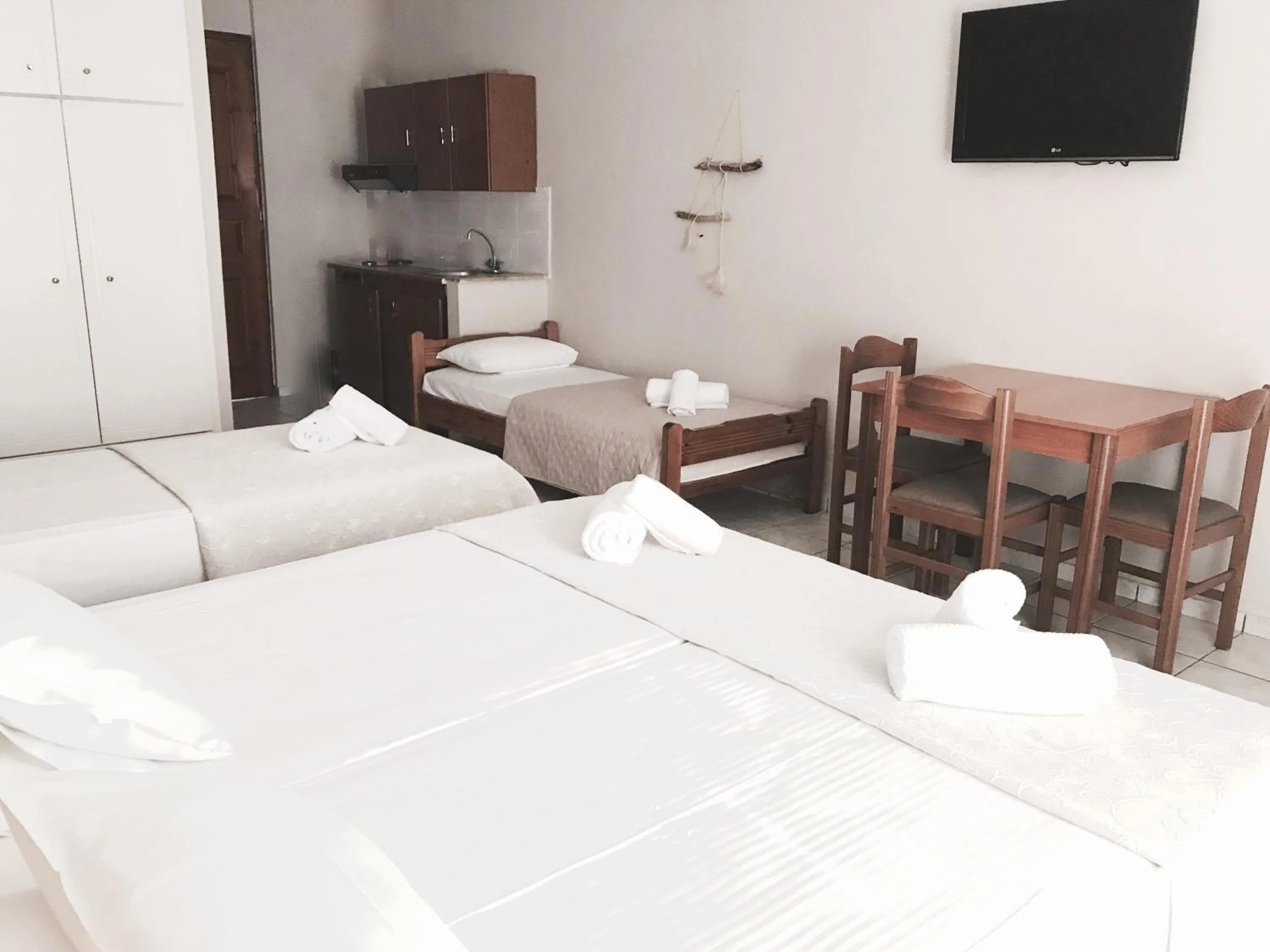 Bed in Calypso Beach Hotel