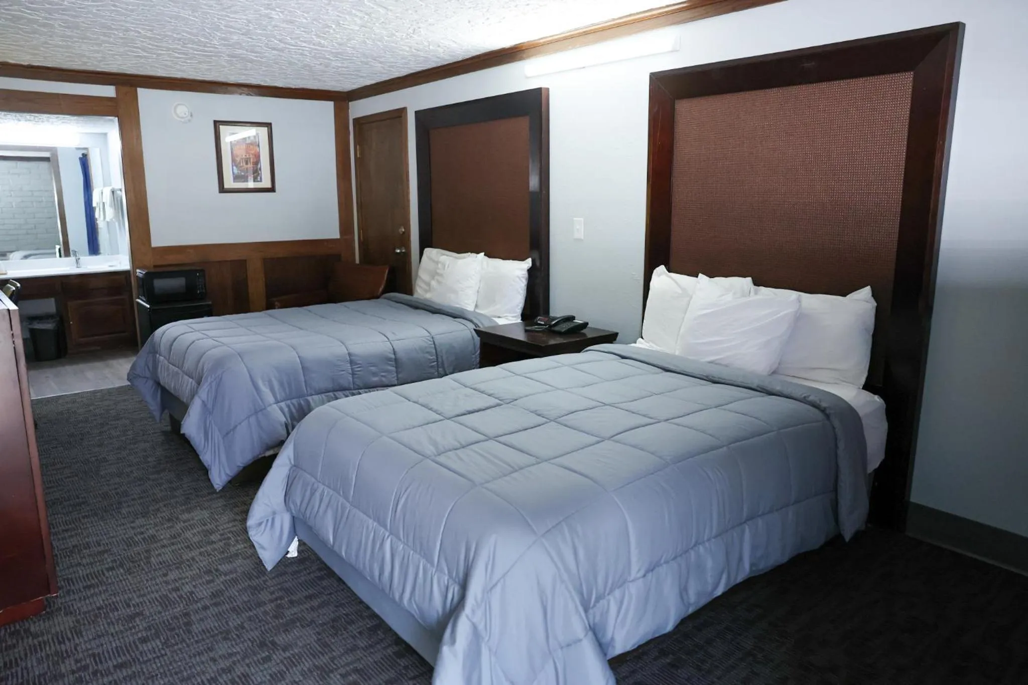 Bed in Rittiman Inn and Suites