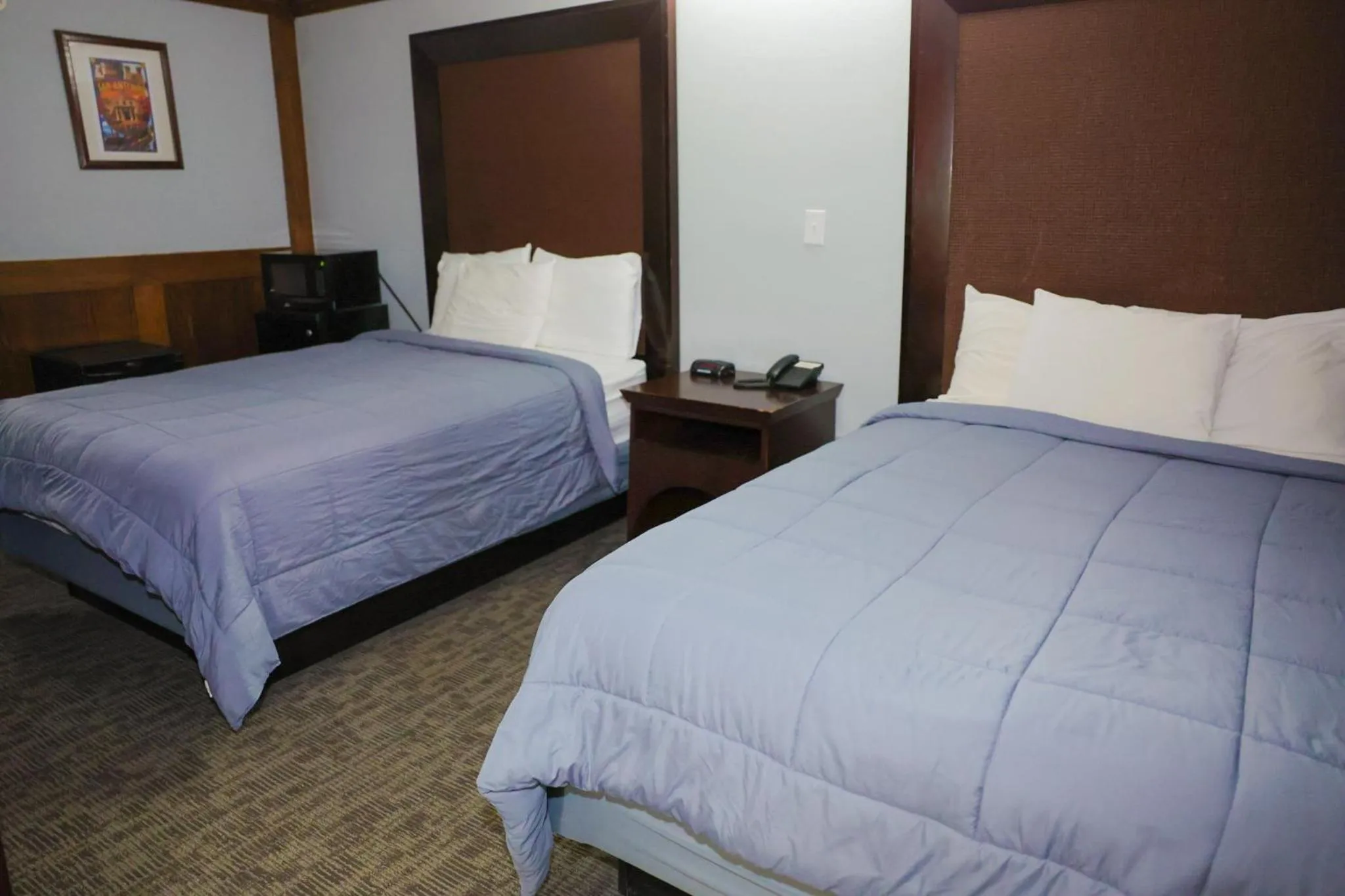 Bed in Rittiman Inn and Suites