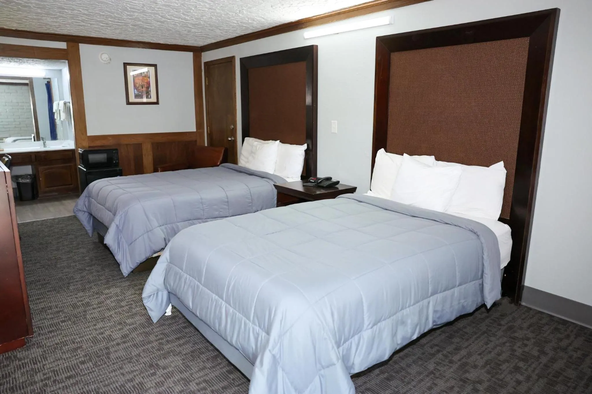 Bed in Rittiman Inn and Suites