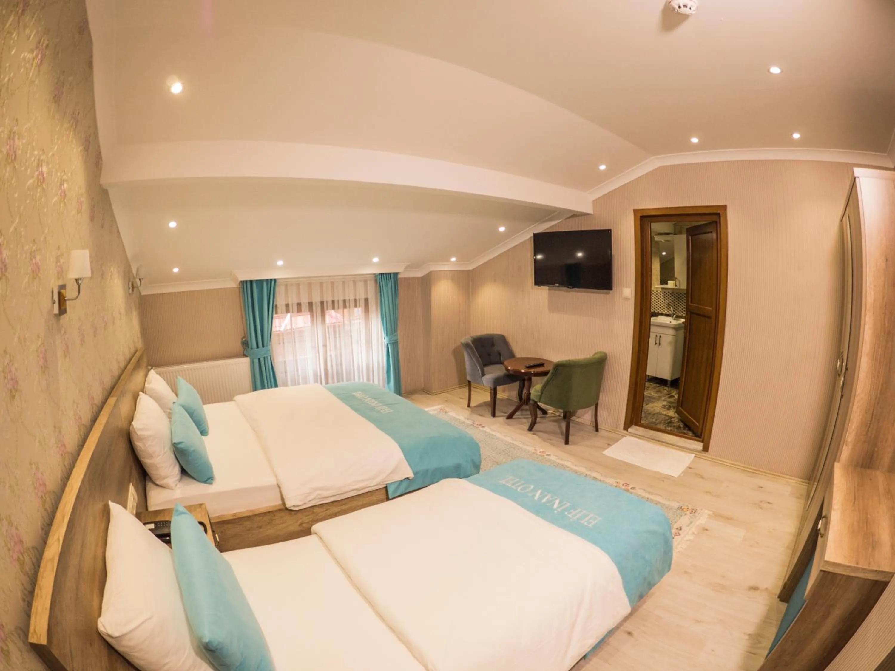 Photo of the whole room, Bed in Elif Inan Hotel