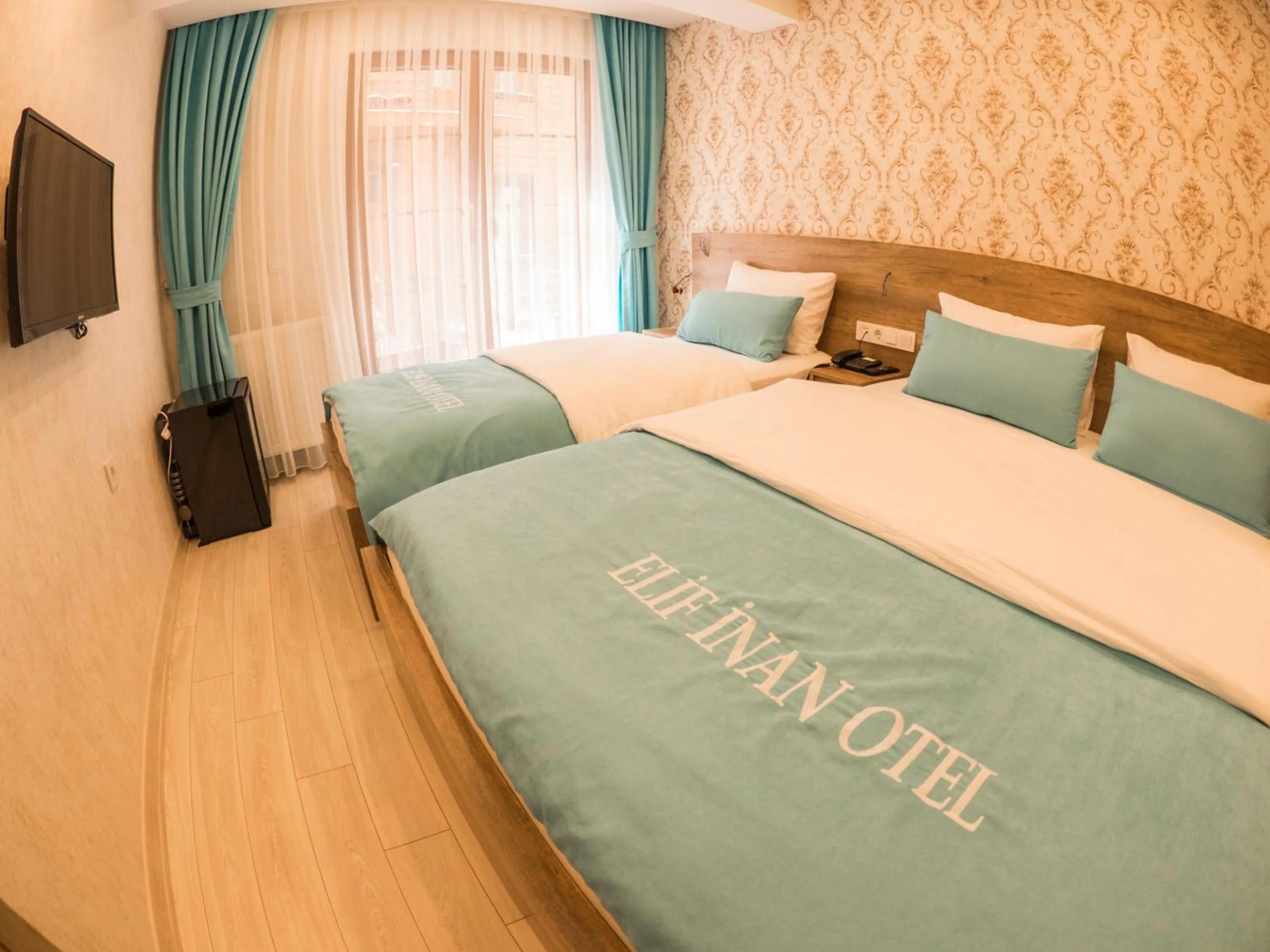 Photo of the whole room, Bed in Elif Inan Hotel