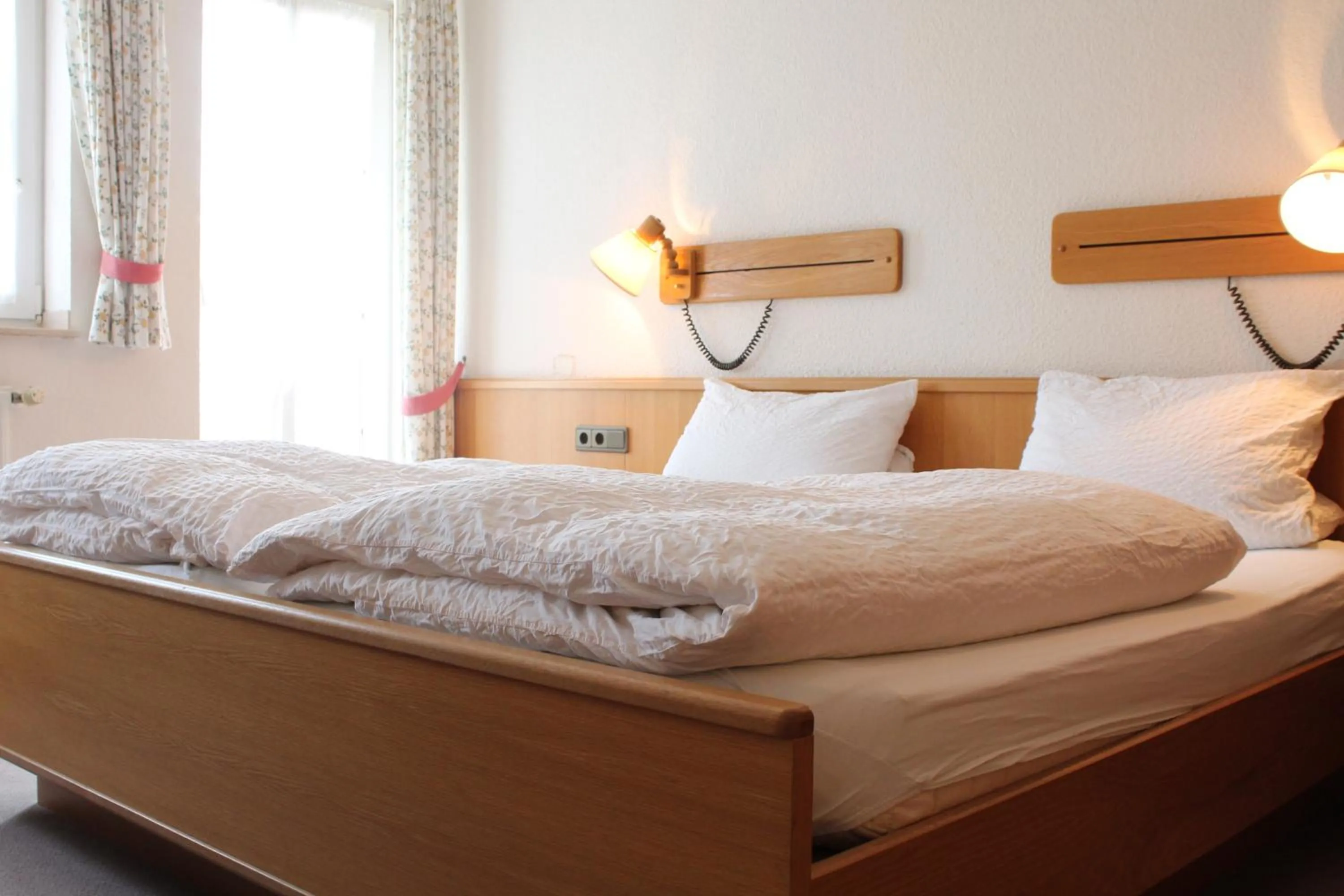 Bed in Hotel Garni Lindenmühle