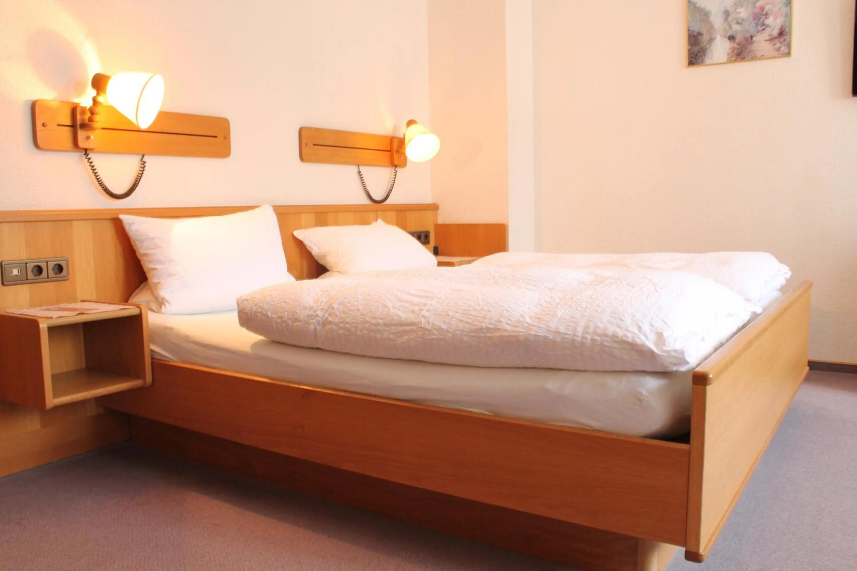 Bed in Hotel Garni Lindenmühle