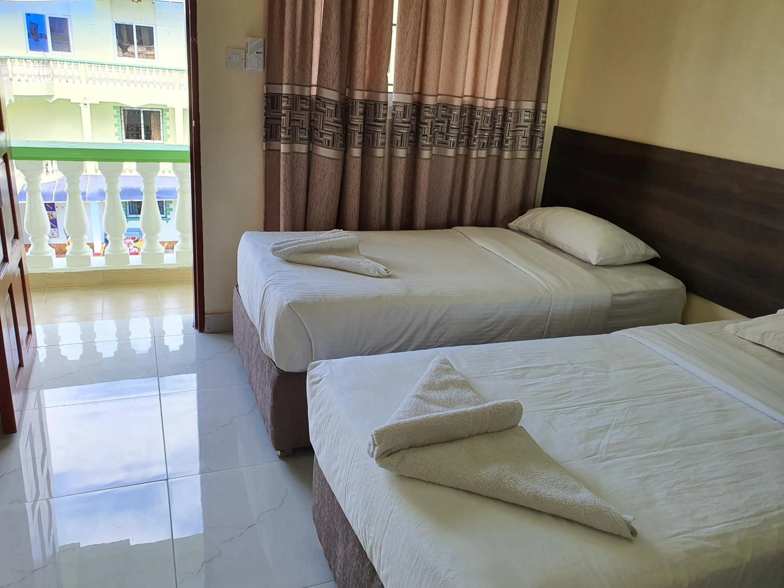 Bed in Prestige Leisure Hotel