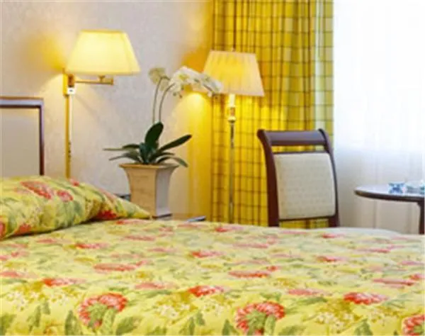 Bed in JJ Grand Hotel