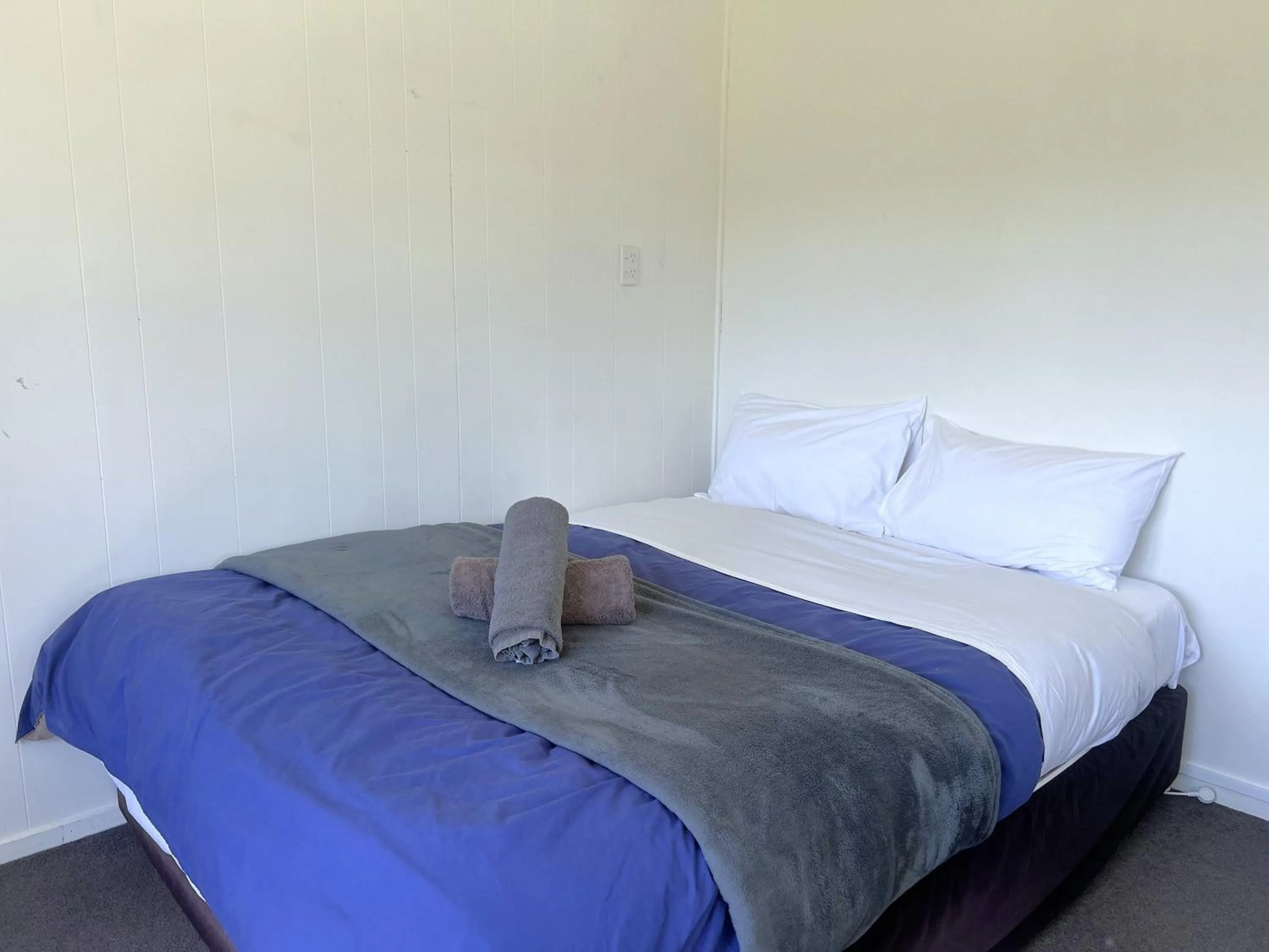 Bed in Mt Aspiring Holiday Park