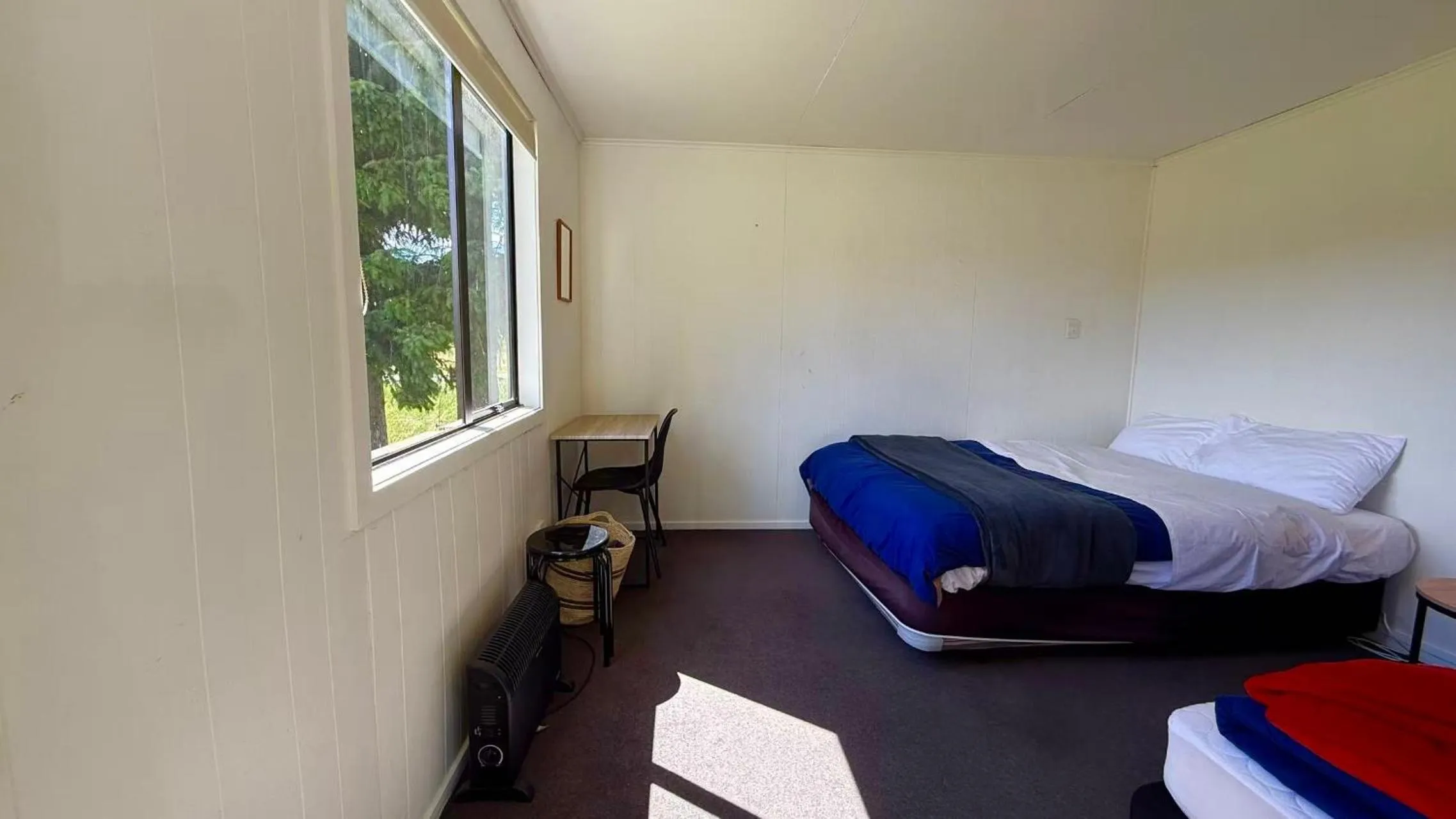 Bed in Mt Aspiring Holiday Park