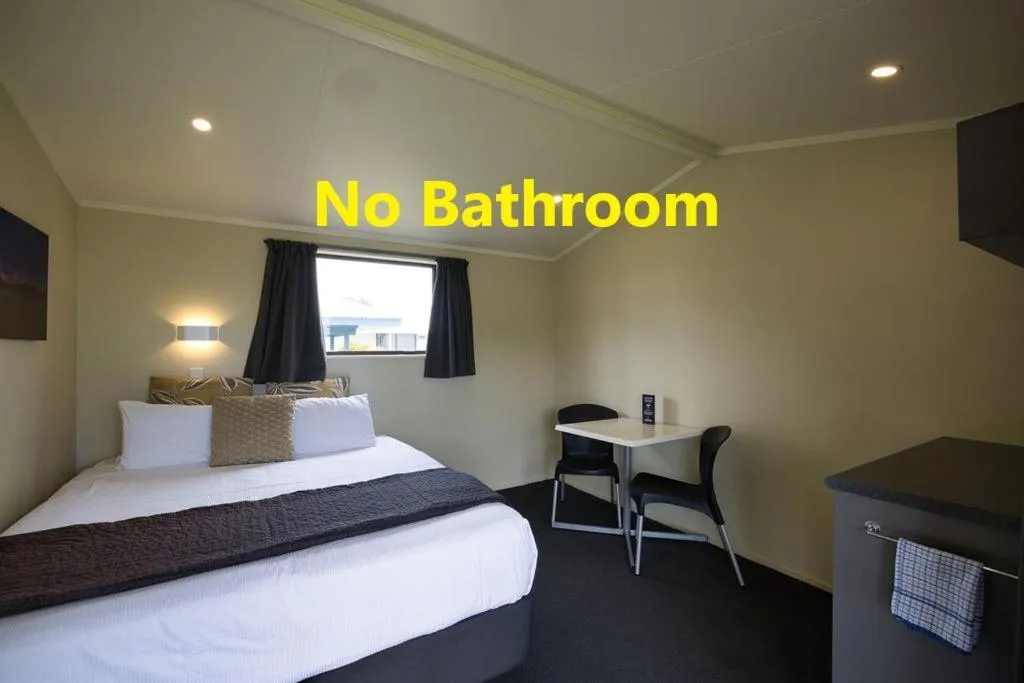 Photo of the whole room, Bed in Tasman Holiday Parks - Papamoa Beach