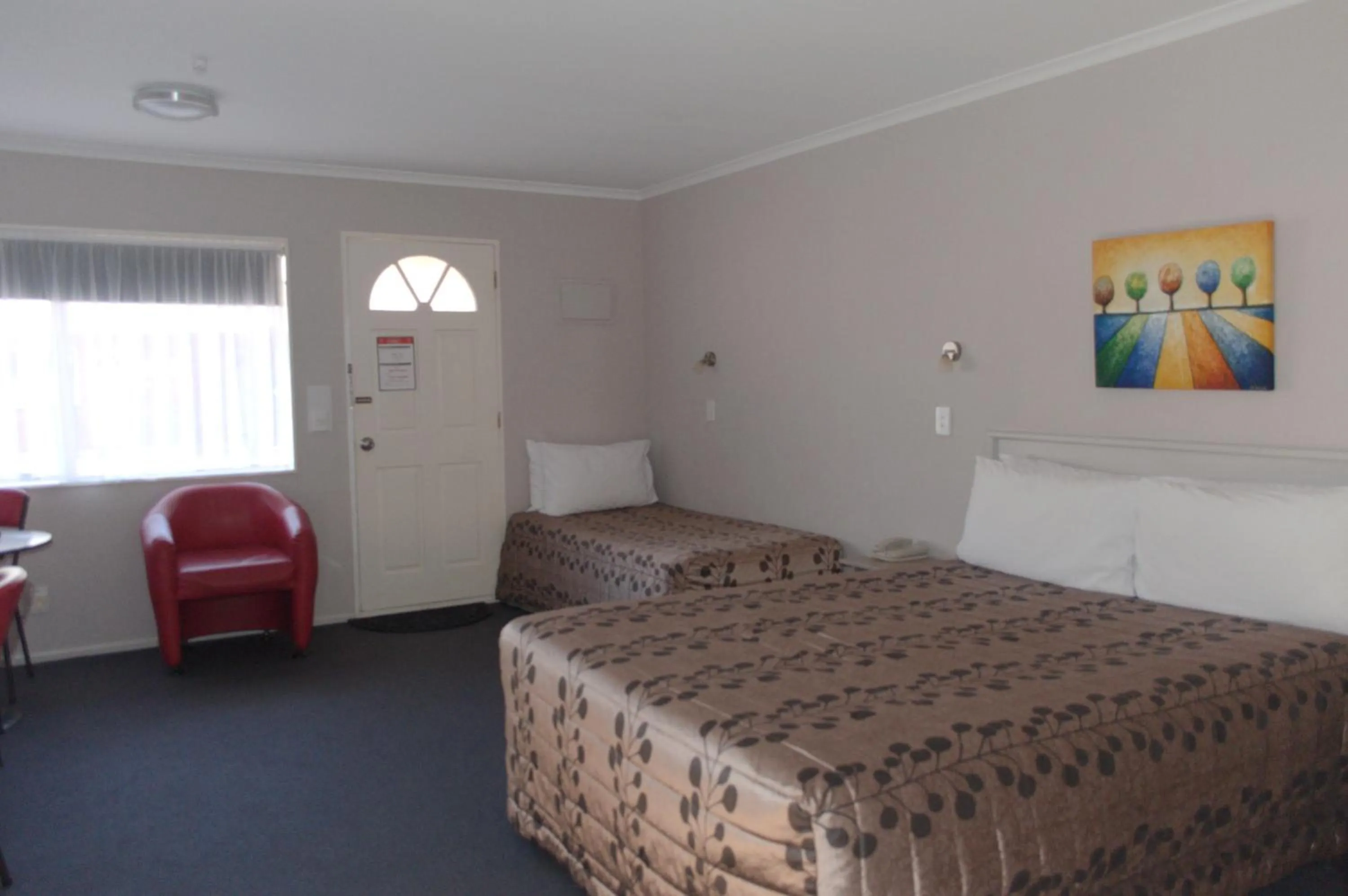 Bed in Carramar Motor Inn